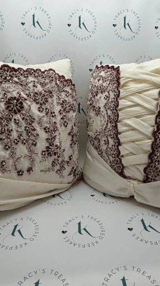 This wedding dress has been in storage since 2011! When Charissa asked me to create at least one cushion from it, I confirmed I could actually do two.
Originally I planned one to be made from the bodice and another from the train/skirt, but when the dress arrived, I realised there was a better way; one cushion featuring the front of the bodice backed with the skirt, and the other showcasing the beautiful lace-up detail.
This way, when they sit next to each other, you see the 'wow' parts of the dress immediately. The bodice, the lace-up back, the stunning details, all preserved and displayed rather than packed away in storage.
From a milestone dress worn once in 2011, to two cushions she can treasure forever.
#TracysTreasuredKeepsakes #SmallBusinessUK #PersonalisedKeepsakes #HertsCustomKeepsakes #HandmadeGiftsUK
