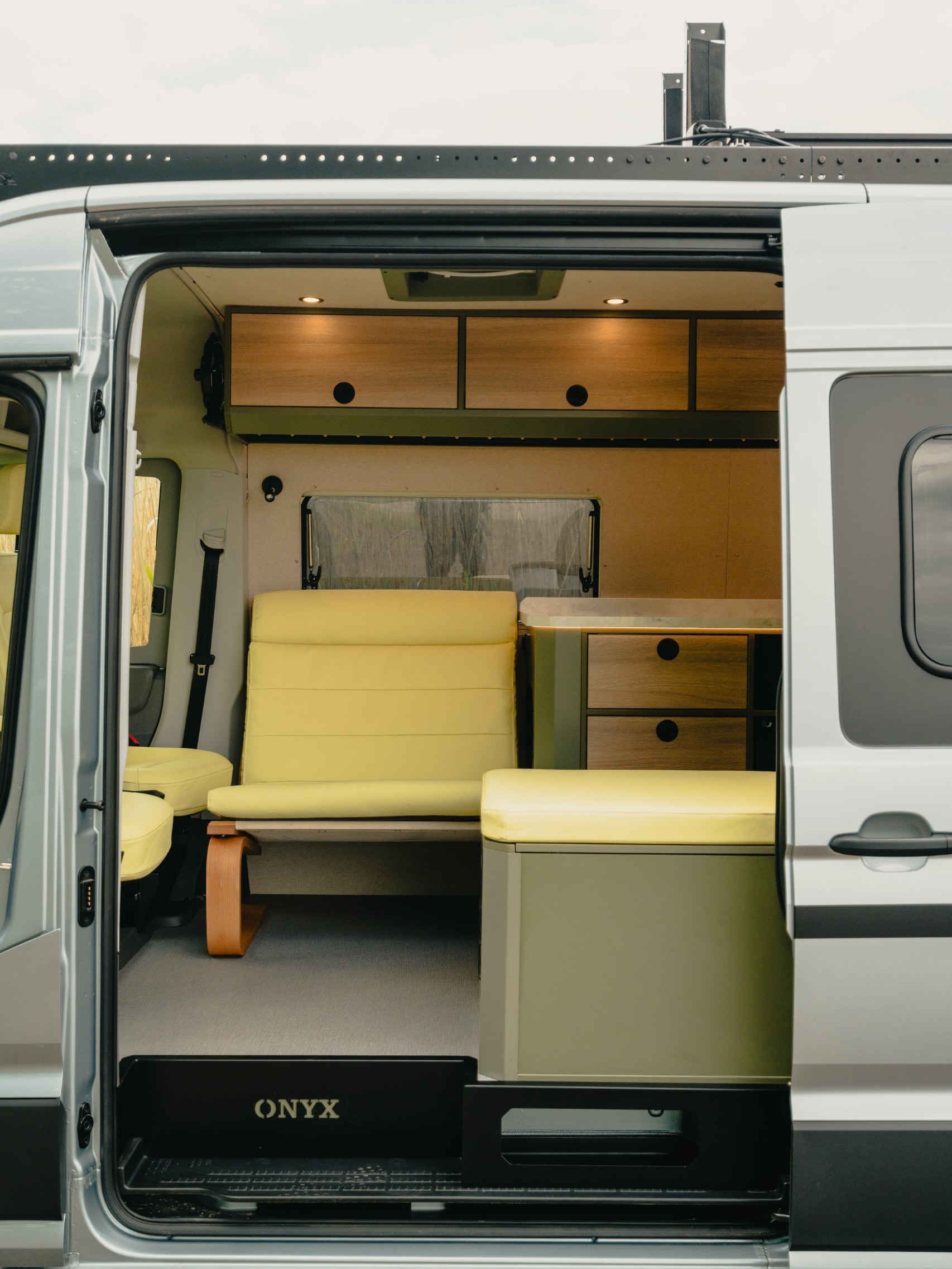 Every detail in here started as a question about how Alistair actually travels. The worktop lip keeps things on the counter when the road doesn’t. The Nespresso lives in a pull-out drawer. The bed slides both ways to free up living space or space in the garage. Nothing is in here by accident.
#OnyxVansUK #MANTGEconversion #CampervanConversion #CustomCampervan #UKCampervan