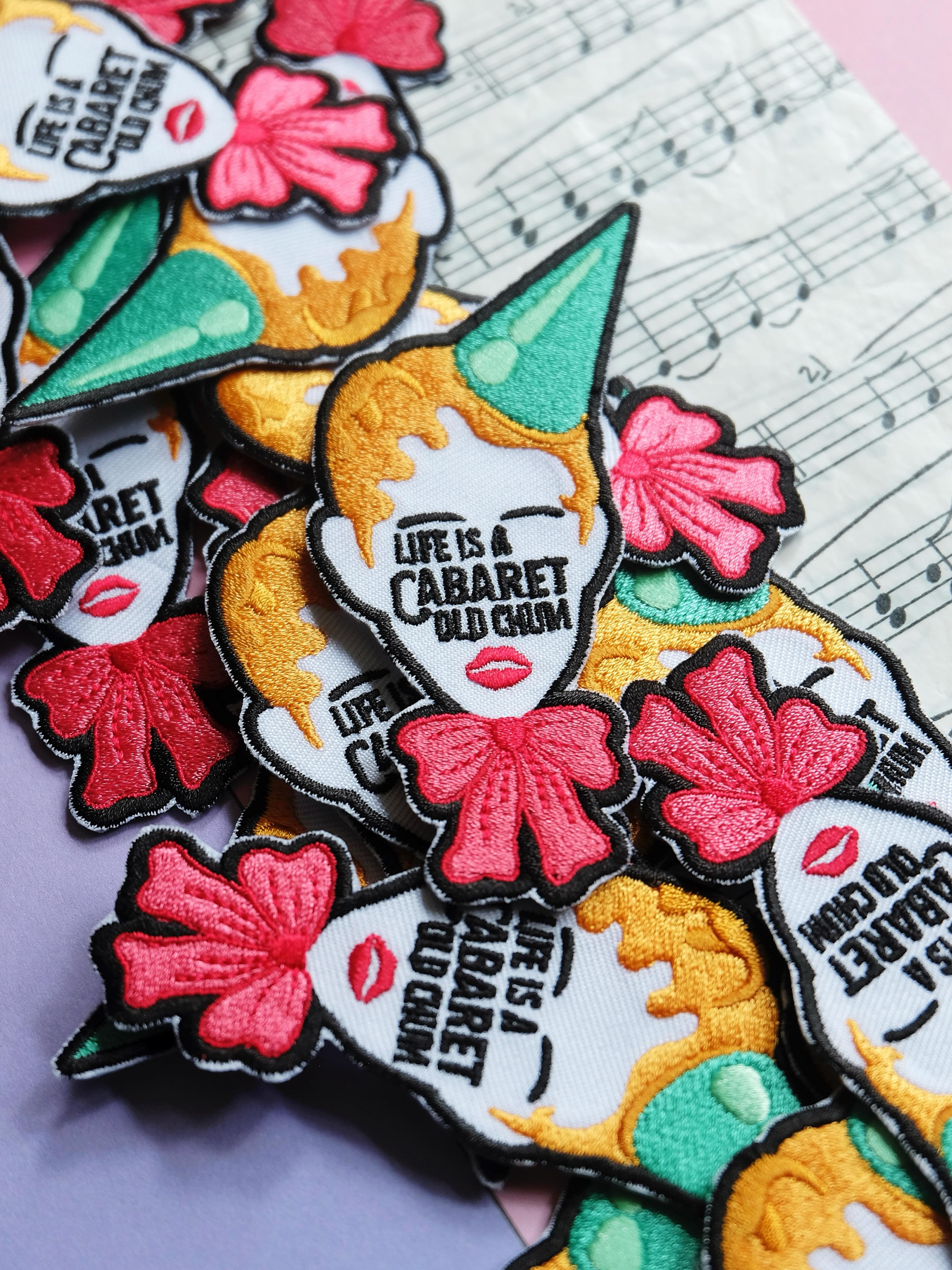 It’s official! This is a @jamiemuscato Emcee world and we’re all just living in it.
I am burning with jealousy knowing there are people out there who witnessed Jamie and Joy make their @kitkatclubldn debuts last nigh. At least I have this neat little Emcee patch to get me through 👀
Cabaret preorders will be shipped out today! And then I might the treat the rest of you by adding them to the shop! Come hear the music play!
#cabaretmusical #jamiemuscato #joywoods #kitkatclub #londontheatre