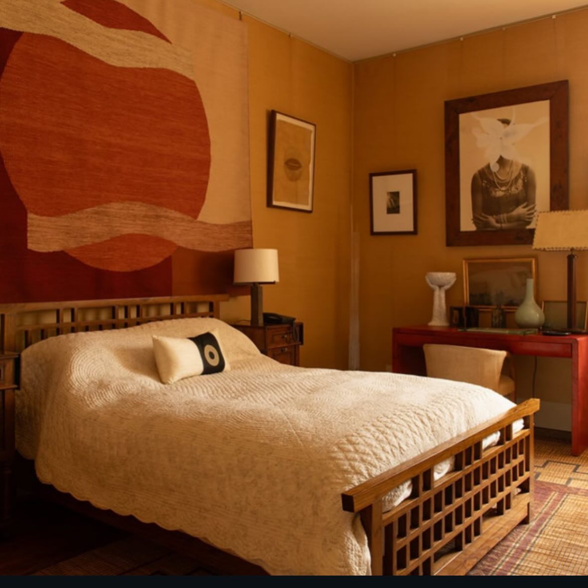 Beautiful photo by @genevievelutkin of a bedroom at Houghton in the ‘modern wing’ , showing @sussycazalet ‘s wonderful wall tapestry, commissioned specifically for the space. On the wall above desk is a painting by @grillo_demo using a photographic portrait of David’s grandmother, Sybil