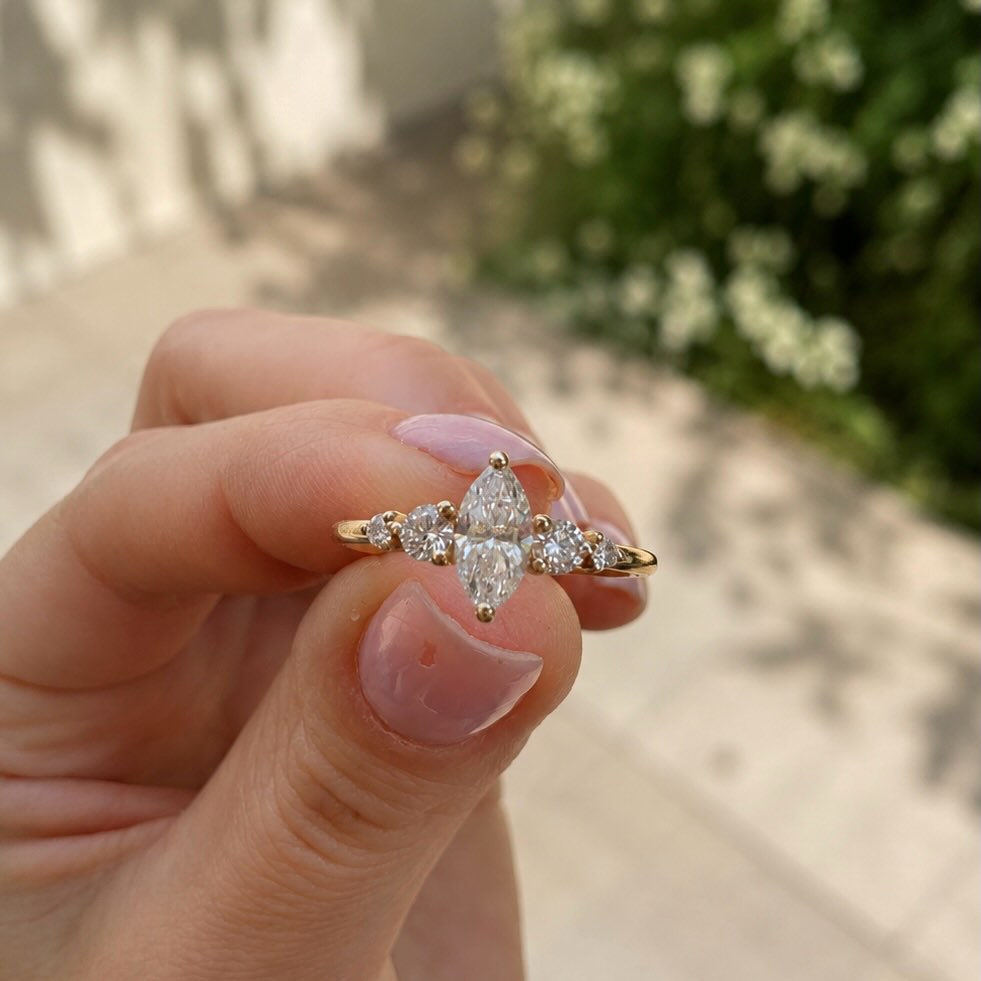 ✨ The elegance of a marquise diamond paired with t…