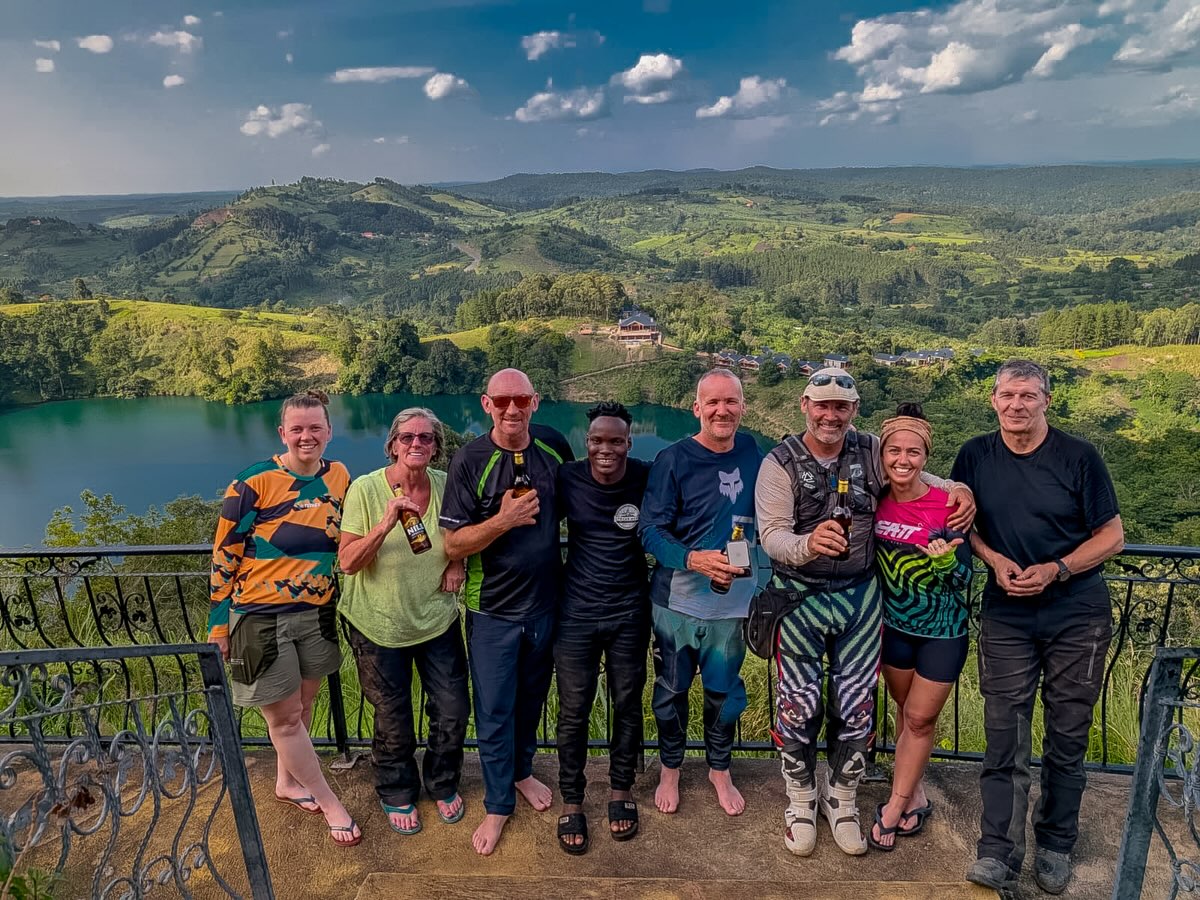 Day three of the Pearl of Africa Tour saw the group leave Murchison Falls behind and point the bikes south towards Fort Portal.
A long day in the saddle today, riding deep through Uganda’s towns and villages, watching everyday life unfold from the seat of the motorcycle. Busy trading centres, roadside markets, waving kids and endless rolling countryside made for a true taste of rural Uganda.
After a full day on the road, the reward waiting at the end was more than worth it… tonight’s stay is at the spectacular Top of the World Lodge, perched high on the mountains above Fort Portal overlooking a stunning volcanic crater lake. Not a bad place for a cold beer and a sunset!
Tomorrow the group splits into two adventures. One group heads into Kibale Forest for chimpanzee trekking, coming face to face with our closest relatives in the wild, while the others will experience a traditional village walk, getting a deeper insight into local culture and daily life here in Uganda.
Another huge day wrapped up and plenty more adventure still to come!