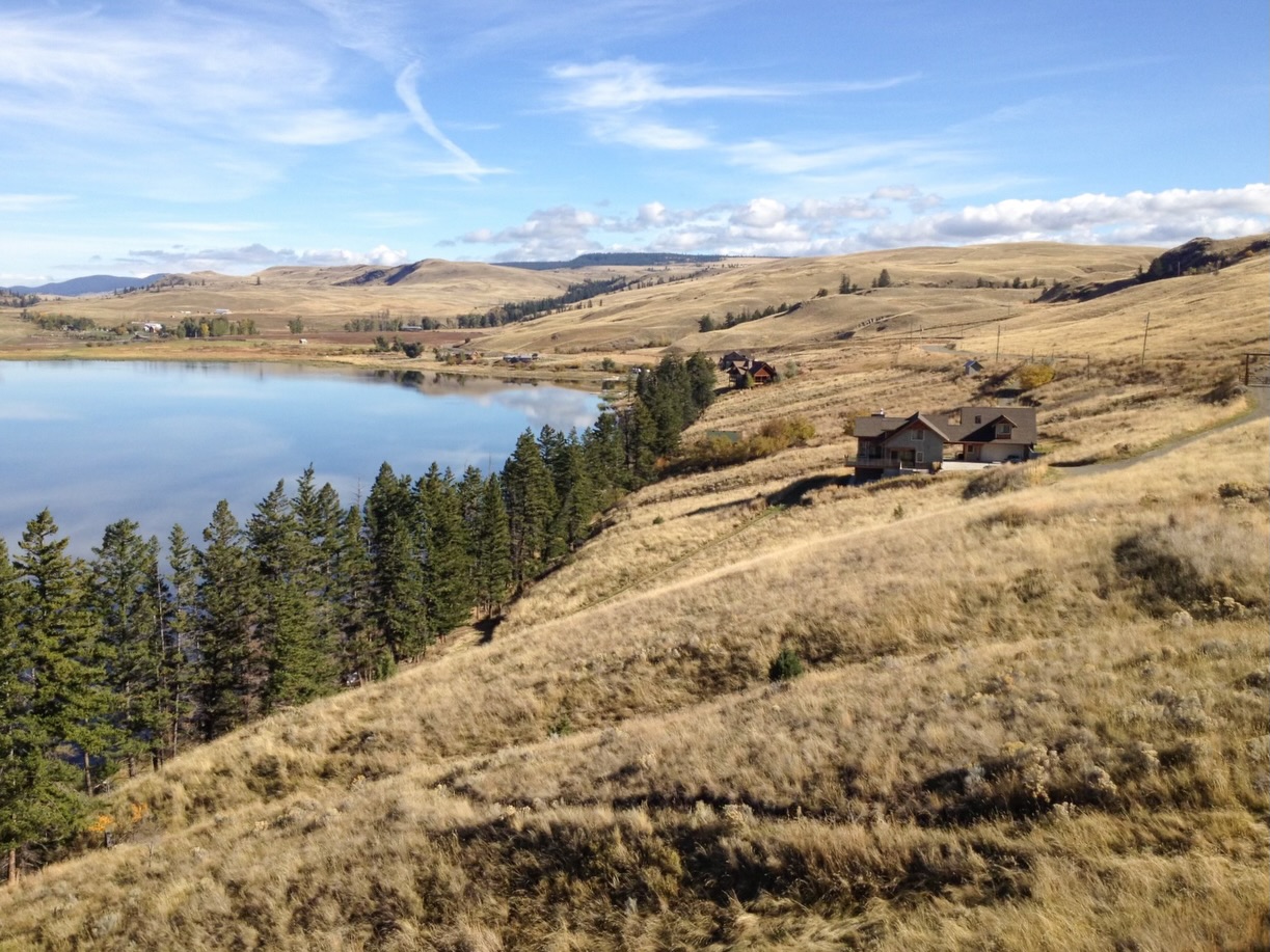 Custom home built on the hillside overlooking Stump Lake. This home was designed to make the most of its unique setting. #ironrosehomes
