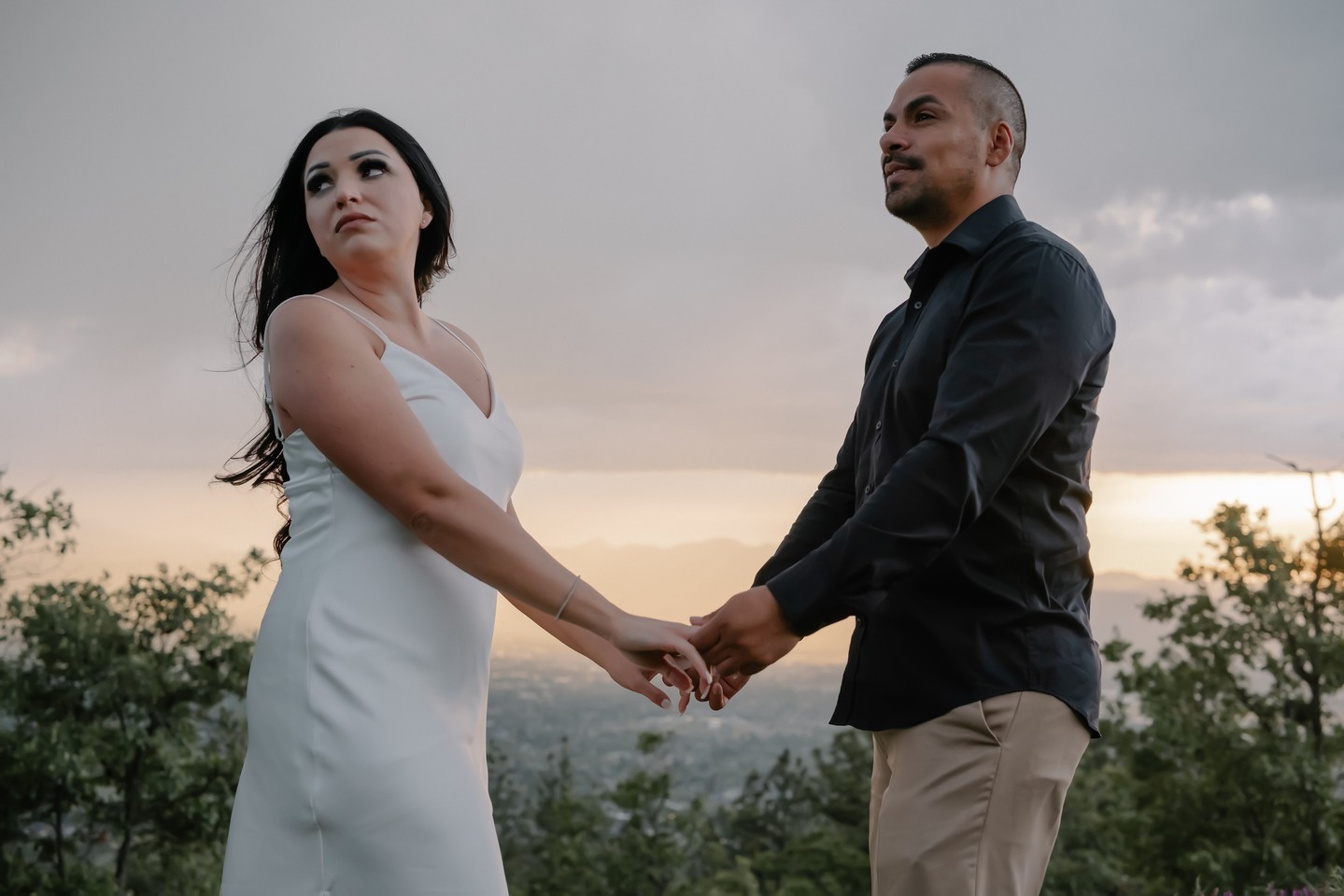 This stormy engagement session in Medford was the perfect reminder that some of the most beautiful moments happen when you fully embrace the weather. The dark skies rolled in over the hills while the wind and soft rain created the dreamiest atmosphere for such a romantic evening. There was something so cinematic about the entire session — dramatic clouds, moody light, and two people completely wrapped up in each other.
Southern Oregon always has a way of showing off, especially during spring storms when everything feels alive and vibrant. The mix of wild landscapes and changing weather made every photo feel emotional, adventurous, and full of movement. Instead of letting the storm take away from the session, it added so much depth and beauty to it.
These two made the entire evening feel effortless. Between the laughter, quiet moments, and the way they looked at each other, their connection stood out in every frame. It was one of those engagement sessions that felt raw, real, and unforgettable in the best possible way.
#medfordweddings #oregonphotographer #weddingphotographer #southernoregon #oregonwedding #pnwwedding #southernoregon #oregoncoast #elopeinoregon #oregonweddingphotographer #oregonweddingideas #southernoregonphotography #roguevalleyphotographers #medfordoregonweddingphotography #grantspassweddings #ashlandweddings #ashlandweddingphotographer #portlandweddingphotographer #professionalphotographermedford #ashlandweddingplanner #ashlandweddingflorist #medfordweddingplanner #grantspassweddingplanner #medfordweddingflorist #medfordweddingvenues #ashlandweddingvenues #grantspassweddingvenues