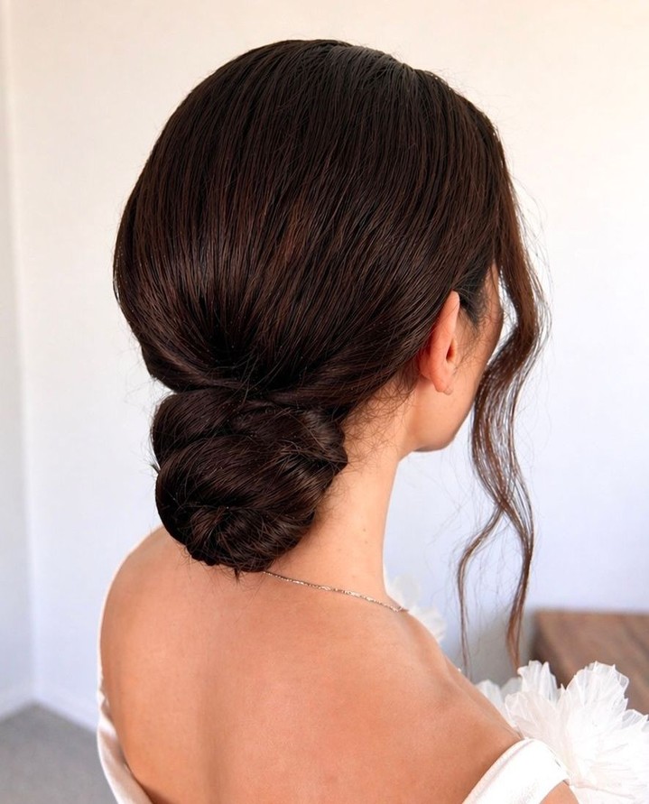 Quiet luxury, bridal edition.â
â
This beautifully crafted low chignon is proof that simplicity is often the most striking choice. Smooth, glossy texture paired with soft movement around the face creates a look that feels refined, romantic, and effortlessly chic.â
â
Designed to complement rather than compete, allowing every bride's natural beauty to take centre stage. Hair artistry at its finest.â
.â
.â
.â
#luxurybridalhair #klluxebeauty #luxuryweddinghairstylist #weddinghairlondonâ â #londonwedding #londonweddingmakeupartist #londonbridalhairstylist â #ukmakeupartistâ #bridalglam #bridalupdo #modernbridalbun #lowbridalbun #bridalchignon #bridalmakeupandhair #luxurybridalmakeup #luxuryweddingmakeup #luxuryweddinghair #destinationweddingmakeup #destinationweddinghair #destinationmakeupartist #londondestinationwedding #londondestinationhairandmakeup #londondestinationbride