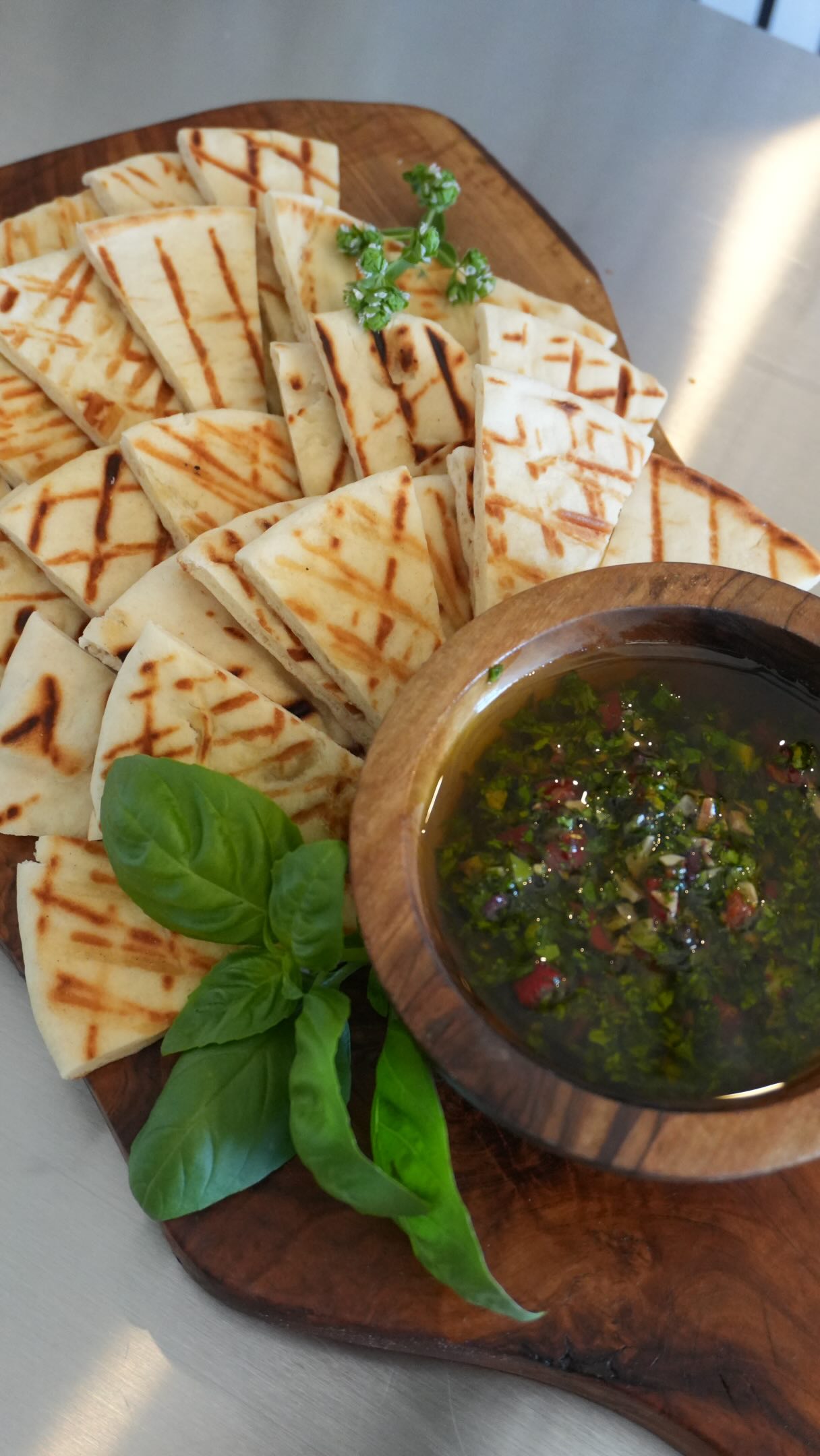 Episode One of my Summer Dipping Oil series. Today, an olive tapenade oil with lemon oil grilled pita šš«
This is not simply bread and oil, this is a vehicle to transport flavor. Crunchy, warm, salty, messy, wine-friendly, cocktail-friendly food meant for lingering around the table long after the sun goes down.
Recipe below and in my Substack at Lenorenolanryan
1/2 cup olive oil
¼ cup red wine vinegar
¼ cup chopped olives
¼ cup chopped roasted peppers
2 T. chopped roasted garlic
3 T. capers
2 teaspoons each chopped Italian parsley, oregano, and basil
Zest of half a lemon
Maldon salt
3 8-inch pita bread
Olive oil for brushing
Maldon salt
Mix the olives, peppers, garlic, capers, lemon zest, fresh herbs, vinegar, and olive oil together. Taste and check for balance. Season with salt. Brush the pita with olive oil and salt. Grill or pan-sear until slightly tosted. Cut into triangles and serve with dipping oil. Enjoy!
#dippingoil #olivetapenade #mediterranean #recipe #appetizer