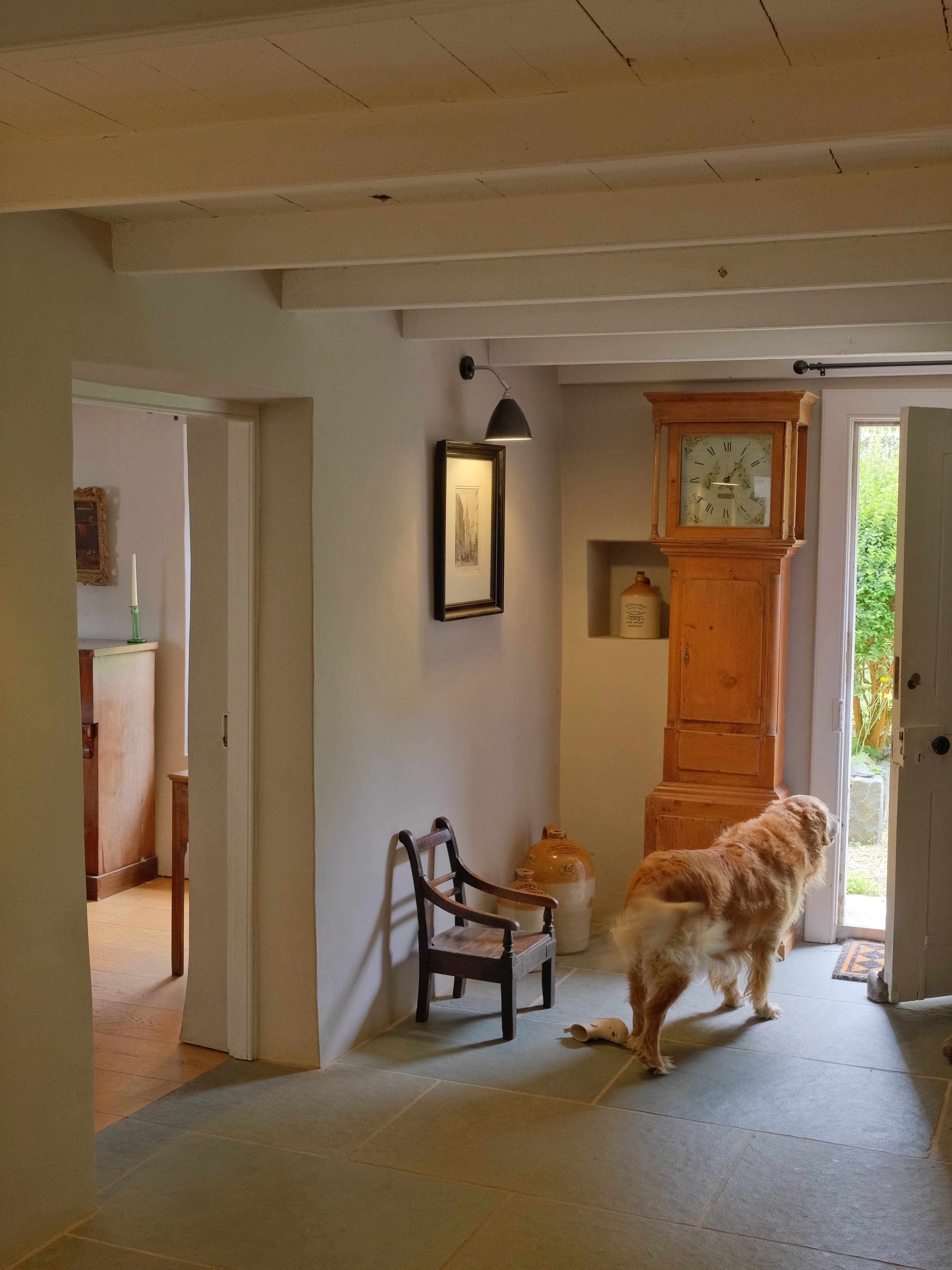 Sunday mornings have their own rhythm. The front door stands open. The dog is already halfway into the garden. Stone floors are cool beneath bare feet and the first cup of tea is never quite finished before the day begins to unfold. We can smell the roses from the front garden through the open living room window. A blackbird perches in the branches of the camellia, charming us with its song.
These are the moments we find ourselves drawn to at Terrou. Not grand interiors or perfectly arranged rooms, but homes that feel lived in. Objects that have earned their place over generations. A little chair tucked beside the door, waiting patiently for muddy boots, small visitors, or a favourite book.
The pieces we collect are chosen as much for the stories they help create as for their history. They become part of family life, gathering memories long after they leave our hands.
This charming early child’s chair is currently available on the website, though today it simply felt at home exactly where it is.
.
#SundayAtHome #TerrouStudio #CollectedHome #EnglishInteriors #AntiqueDecor