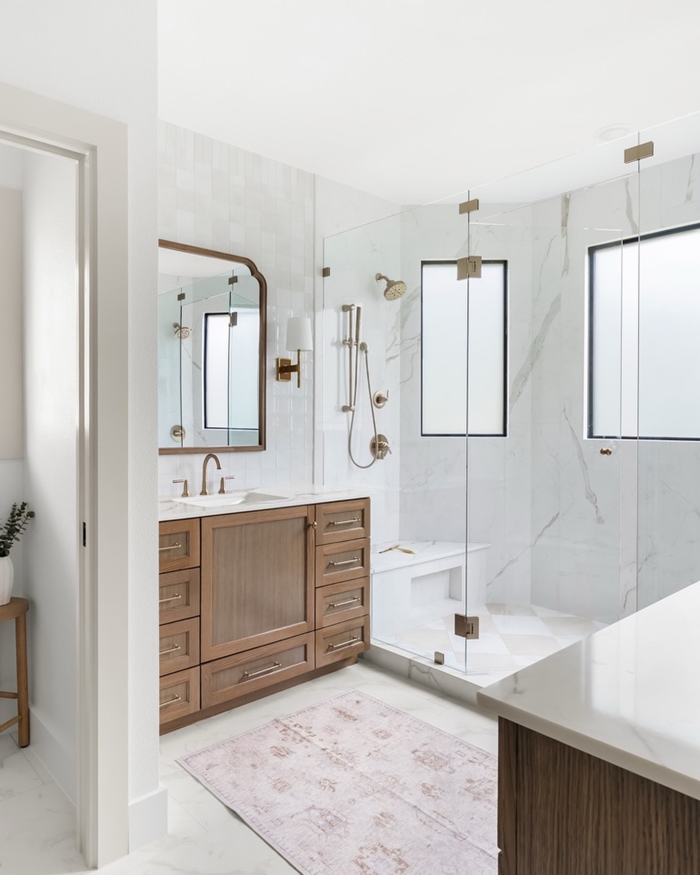 A bathroom designed to feel like a retreat. ✨
Soft tones, warm wood cabinetry, timeless tile, and natural light come together to create a space that feels calm, elegant, and effortlessly inviting.
#SamanthaKateInteriorDesign #BathroomDesign #TimelessInteriors #LuxuryBathroom #InteriorDesign