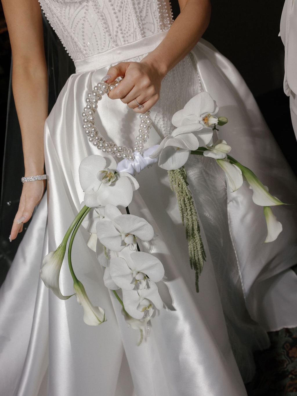 We had to dedicate a post to the bouquet itself. ✨
The pearls. The calla lilies. The cascading orchids. The bouquet bag. Every detail felt like a work of art.
One of those designs we’ll be thinking about for a very long time and one that will always hold a special place in our hearts.
We couldn’t have had a more beautiful bride carry it down the aisle other than Kendyl🤍
Team Credits|
Coordination - Whimsical @whimsical_creative_tx
Florals - Whimsical @whimsical_creative_tx
Photography / Video - anna Halie photo @annahailephoto
DJ - Paul Paxton @paulpaxton_
Saxophone- Alex Jones @baudoptics
Piano - Herman lee
Photo booth- Fotably @fotably
Disco Dancers - Cheyenne Elysian
Hair and Make up - Misty Rockwell @mistyrockwellartistry
Officiant - Alex Rasmussen
Venue - La Colombe D’or @lacolombedorhtx
If we missed tagging anyone or would like to collaborate on a post, please send us a DM. It’s so important to us to give credit where credit is due, and we’d love to make sure every talented vendor is properly recognized.
#wedding #luxuryweddings #houston #weddingdesign #texasweddings