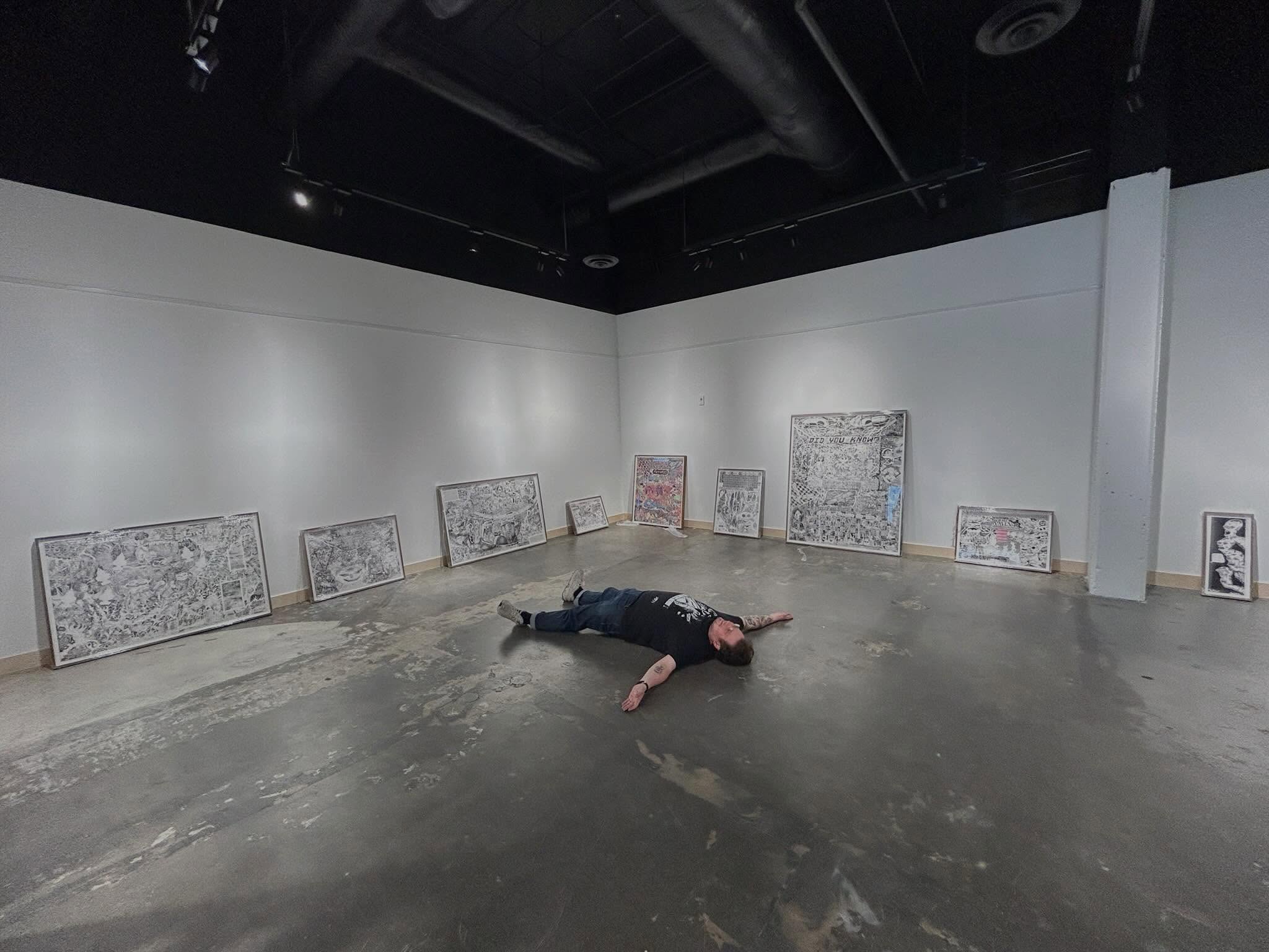 🔨🦺 Artist at work!!
“Escape the Hell Dimension” by @doomkitsch opens this Saturday at 5:30 pm at the YK Visitor’s Centre. Jonah’s large complex pen & ink drawings have been professionally framed @norberghall - they look so classy!
By the artist’s request we will be celebrating his fine art with low brow foods (beer and pizza and corn dogs) from our guilty pleasure locale: Bruno’s. Come one, come all!