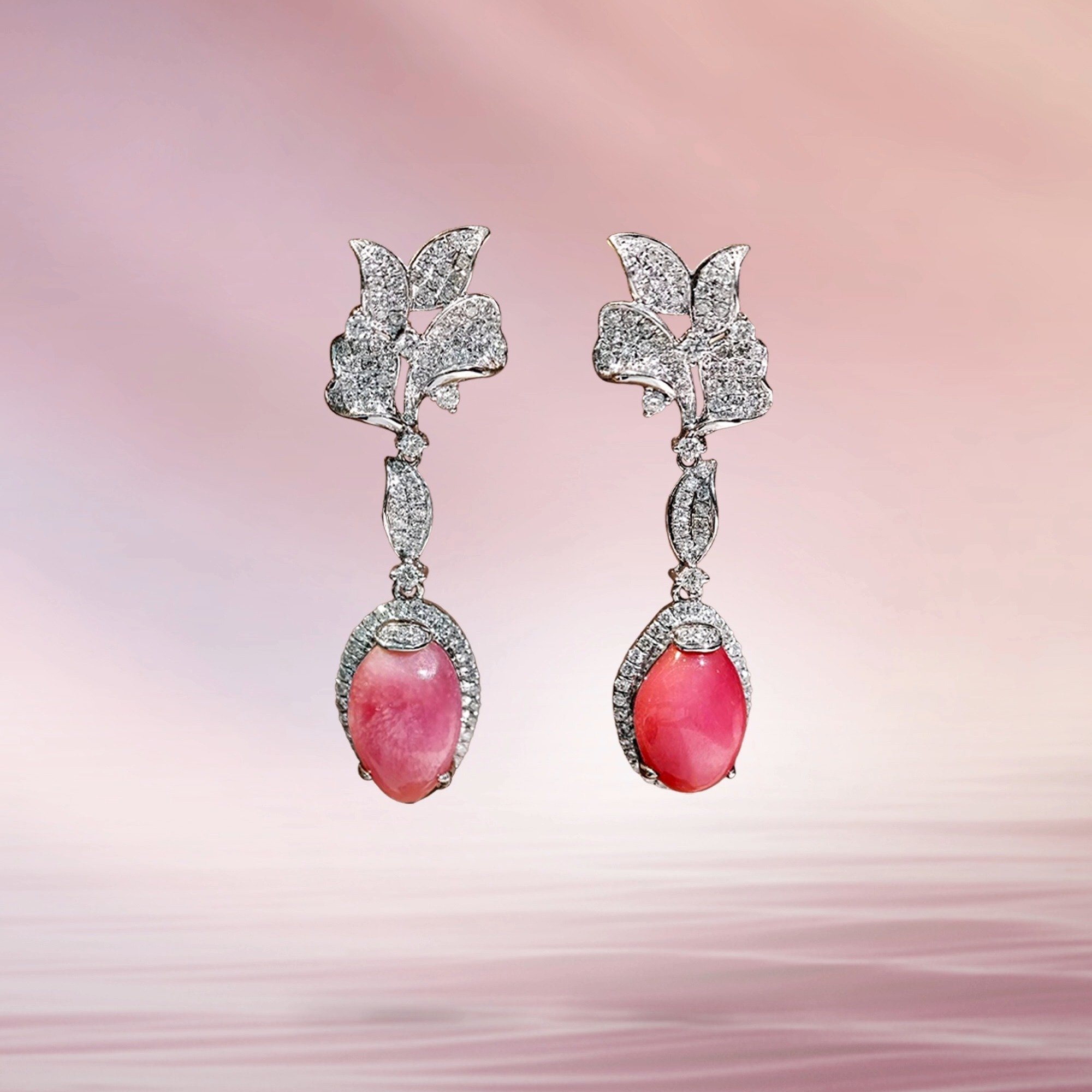CONCHÉA — FLAMINGO FLEUR
A bloom suspended in motion.
These graceful drop earrings feature a beautifully matched pair of natural conch pearls totaling 6.05 carats, glowing in vivid flamingo pink tones with visible flame structure unique to nature's rarest treasures.
Framed by diamond-set floral motifs and crafted in 18K white gold, each pearl moves with quiet elegance, capturing light with every turn.
Soft yet radiant.
Delicate yet unforgettable.
A celebration of femininity in its most refined form.
Natural Conch Pearls: 6.05 CT Total
Diamonds: 0.96 CT Total
18K White Gold
Length: 3.7 cm
#Conchea #ConchPearl #NaturalConchPearl #FlamingoPink #LuxuryJewelry #DiamondEarrings #FineJewelry #PearlCollector #ThePearlVogue