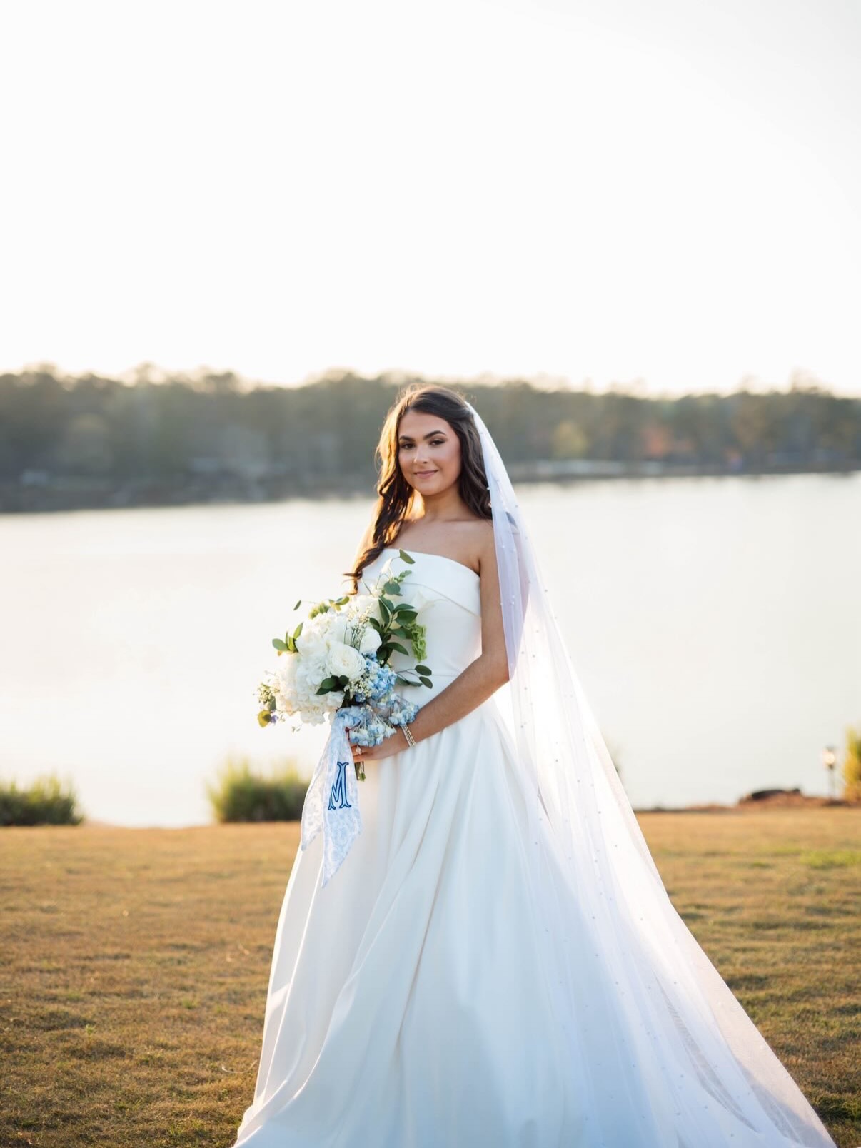 Lilli looked absolutely stunning in Stella York #7045, and we truly can’t imagine a more perfect gown for her special day. 🤍
One of our favorite things is seeing our brides shine on their wedding day and getting to relive those beautiful moments through your photos. If you’re a Diane’s bride, send us your wedding photos. We love celebrating you!
Venue: @newwaterfarms
Day of Coordinator: @alexandereventsilc
Photographer: @monicajadephotography
Second Shooter: @jake_farris
Videographer: @mabbsfilm
Second Shooter: @atg_films_
Ceremony Band: J & K Band
Reception DJ: @the.djcompany
Caterer: Anne Watkins Catering
Makeup: @looksbygracee_
Hair: @hair_by_kaitlin