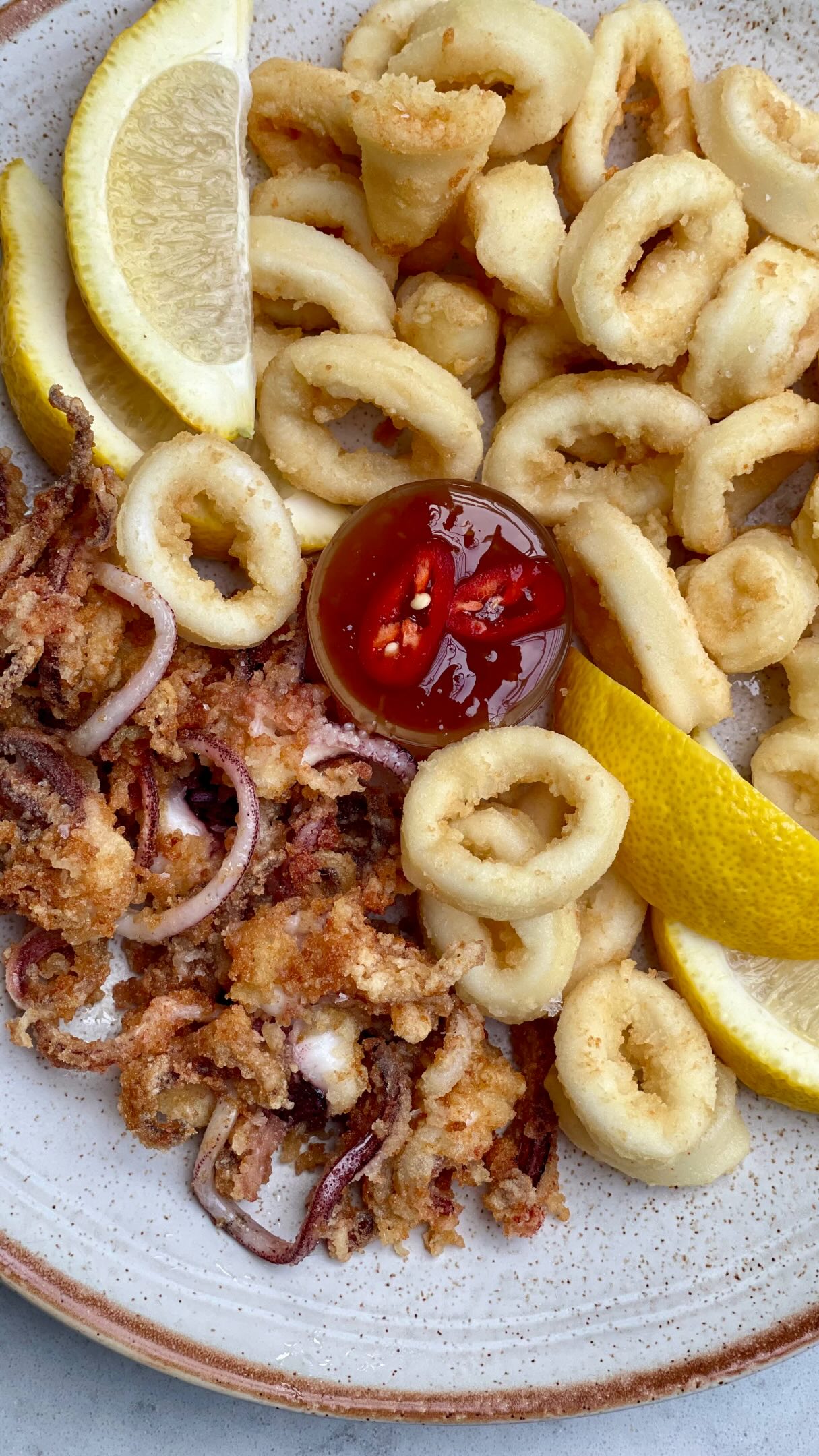 Calamari Fritti 🍋 Save this one, crispy golden fried squid, ready in minutes ✨
The Italian antipasto I come back to again and again. Here’s how to make it at home:
🦑 Ingredients (serves 2)
• 400g fresh squid
• 100g semola rimacinata
• 2 tbsp corn flour
• Salt & black pepper
• Vegetable oil, for frying
• To serve: lemon, fresh chilli, coriander & sweet chilli sauce
👩🍳 Method
1️⃣ Rinse the squid, separate the body from the head and cut into 0.5cm rings. Pat very dry.
2️⃣ Mix the semola, corn flour, salt & pepper. Toss the squid until well coated.
3️⃣ Heat the oil to 180°C — a piece of squid should sizzle straight away.
4️⃣ Fry in small batches until golden & crisp, rings first then tentacles. Drain on paper.
5️⃣ Season with salt and serve hot with lemon, chilli and a dipping sauce 🌶️
Pour a spritz, fry a few rings, and you’ve got la dolce vita in your own kitchen.
Adele X
#CalamariFritti #FriedSquid #ItalianRecipes #Antipasto #ItalianFood