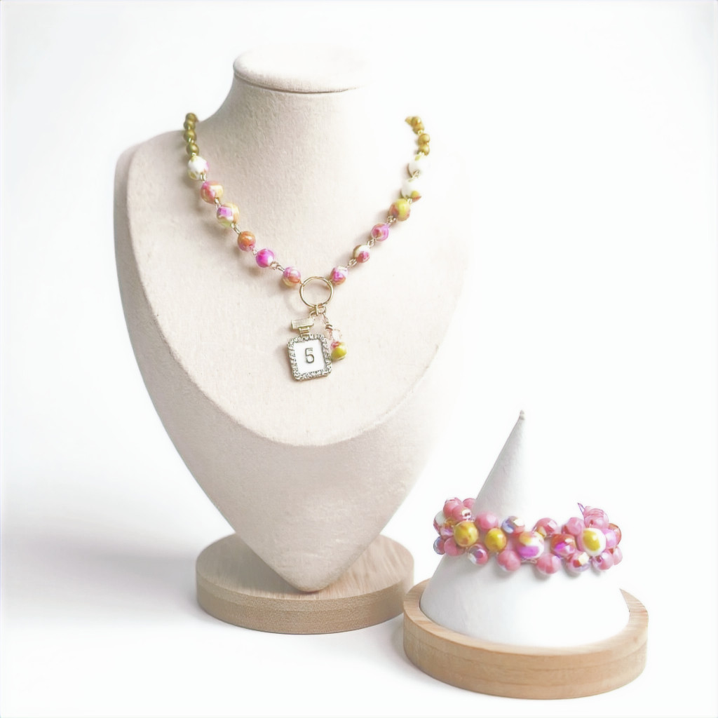 Dreamy, vintage-inspired, and utterly unique — meet “Fleurs de Pluie.” Rain Flower gemstones, gold-washed Czech glass accents, and a sweet enamel perfume bottle charm make this necklace + bracelet set a wearable work of art. Necklace ≈19"; bracelet fits ≈7"–8". Limited stock — Link in Bio #FleursDePluie #RainFlower #Handcrafted #JewelryOfTheDay #TheQuarryShop