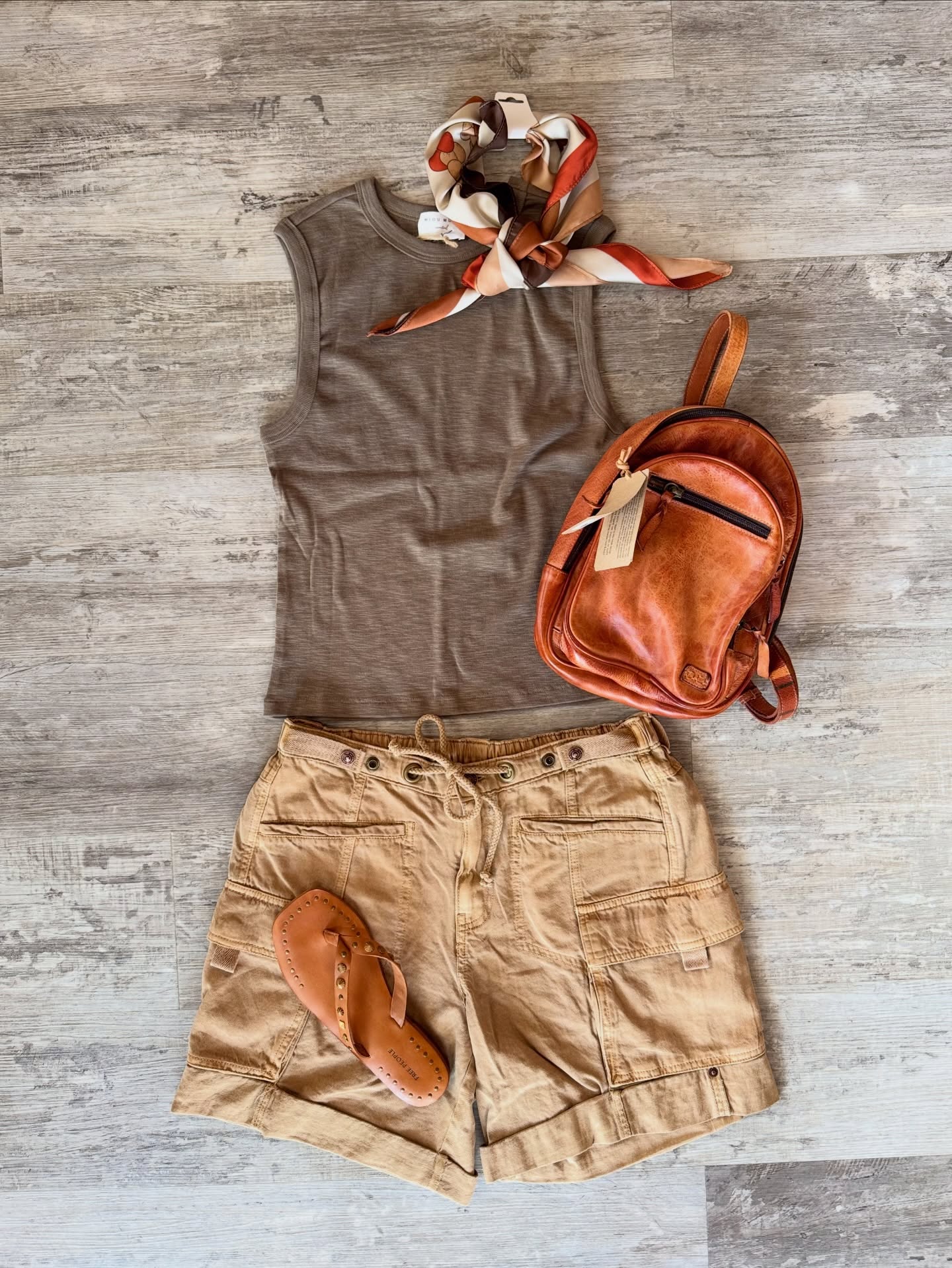 Shorts & a tank top can feel quite basic on their own, but adding a few purposeful accessories can quickly elevate your outfit!