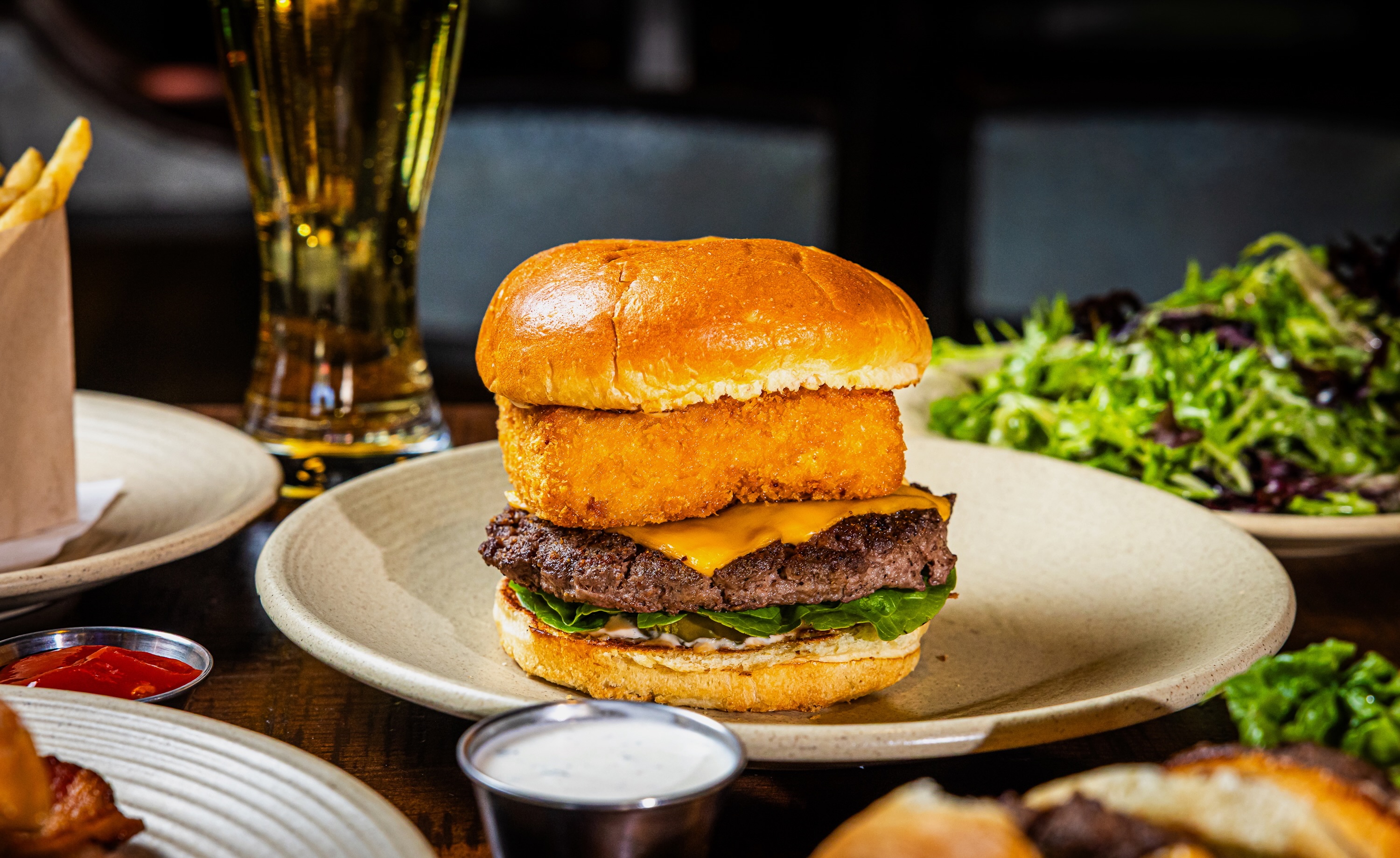 this is not your average burger…the mac and cheese bandit is a juicy burger patty stacked with....