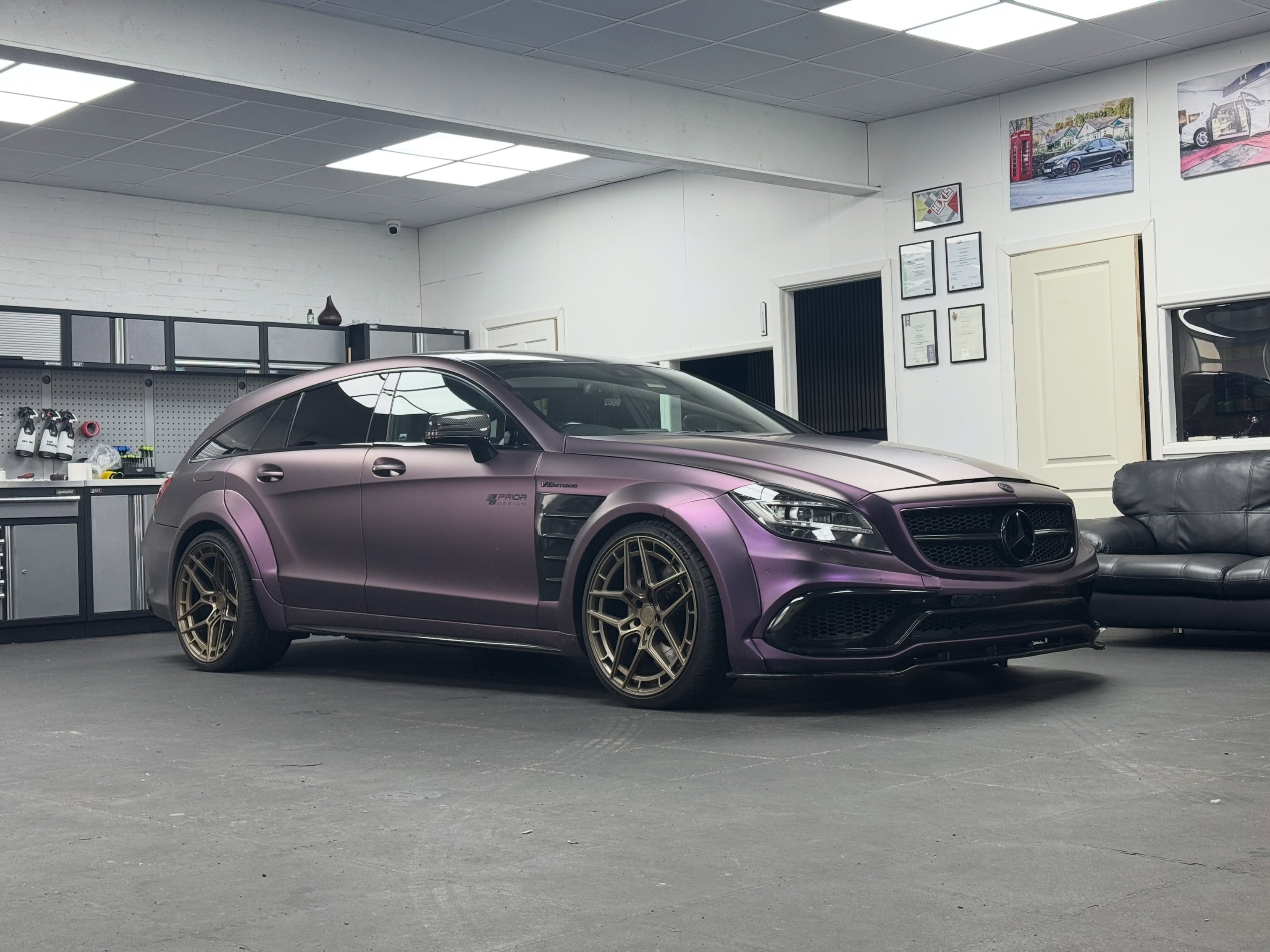 Mercedes CLS63 Shooting Brake Prior Design edition wrapped in our PPF Satin Pinot Noir Purple, all chrome trims wrapped in gloss black. Every inch of this beaut is wrapped in PPF or in our black wrap. #mercedesbenz #cls63 #colouredppf #thewrapper #amggang @conergies @priordesign