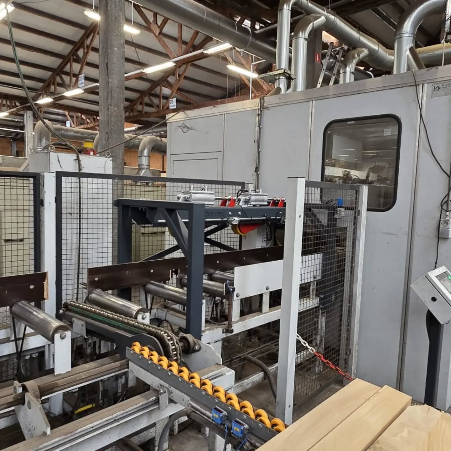 Custom made outfeed pressure rollers to help this #weinig H45 feed out large beams.