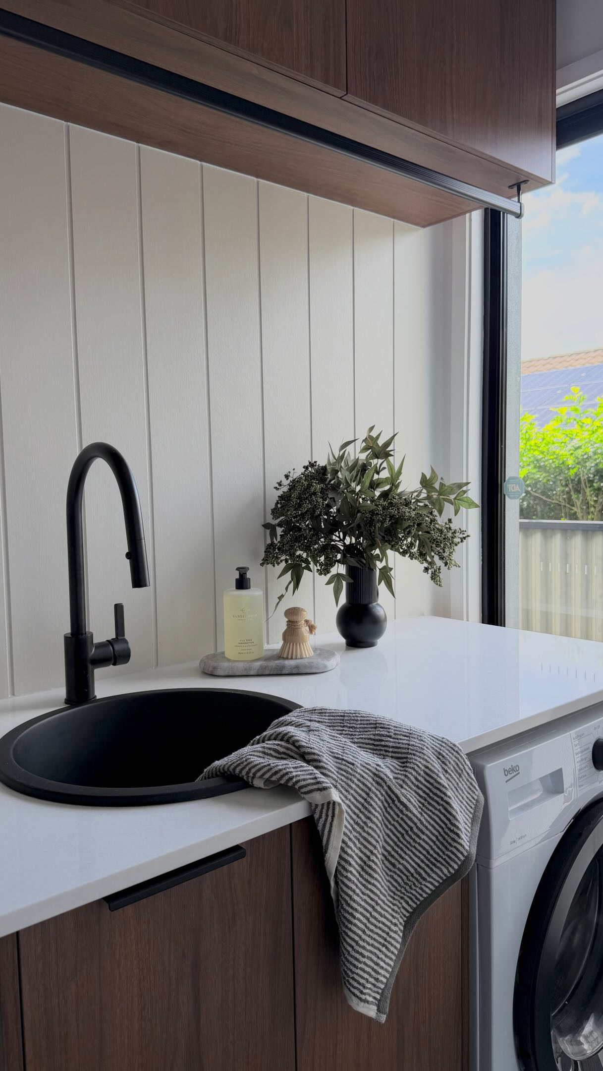 LAUNDRY / / FOREST OAK
Laundry goals:
- Benchtop space for folding ✔️
- Hanging Rail ✔️
- Pull out Mixer for filling up tall buckets easily ✔️
- Vendlines on the wall so no more clothes horses hanging about. ✔️
- Good sized tall cabinet for mop & vacuum with a PowerPoint inside for charging ✔️
- Make it beautiful ✔️
Cabinetry: Florentine Walnut by @polytec
Benchtop: Rosemee by @ydlstoneau
#laundry #interiordesignergoldcoast #cabinetry #renovation #benchtop