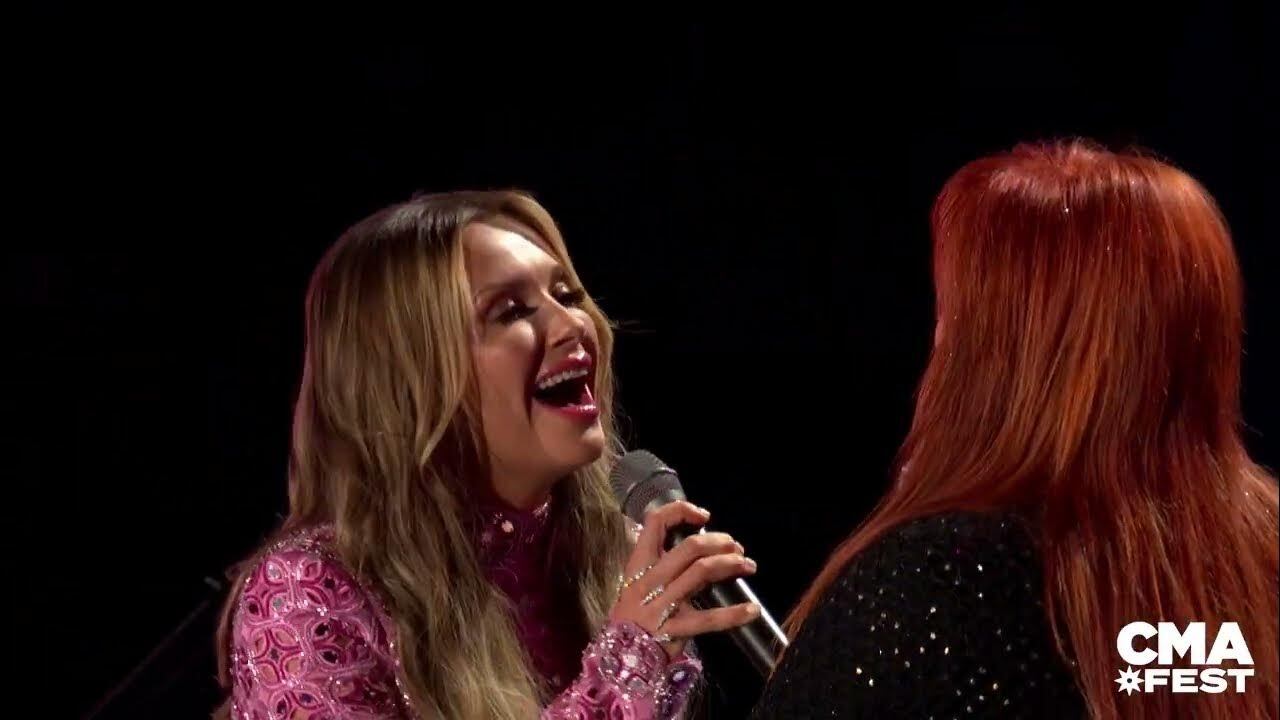 Carly Pearce welcomed guest Wynonna Judd for a performance of "Why Not Me" during CMA Fest at Nashville's Nissan Stadium four years ago. #MusicIsLife https://youtu.be/s1f3ojweMVs?si=L44IVF_ynDJW4SGO
