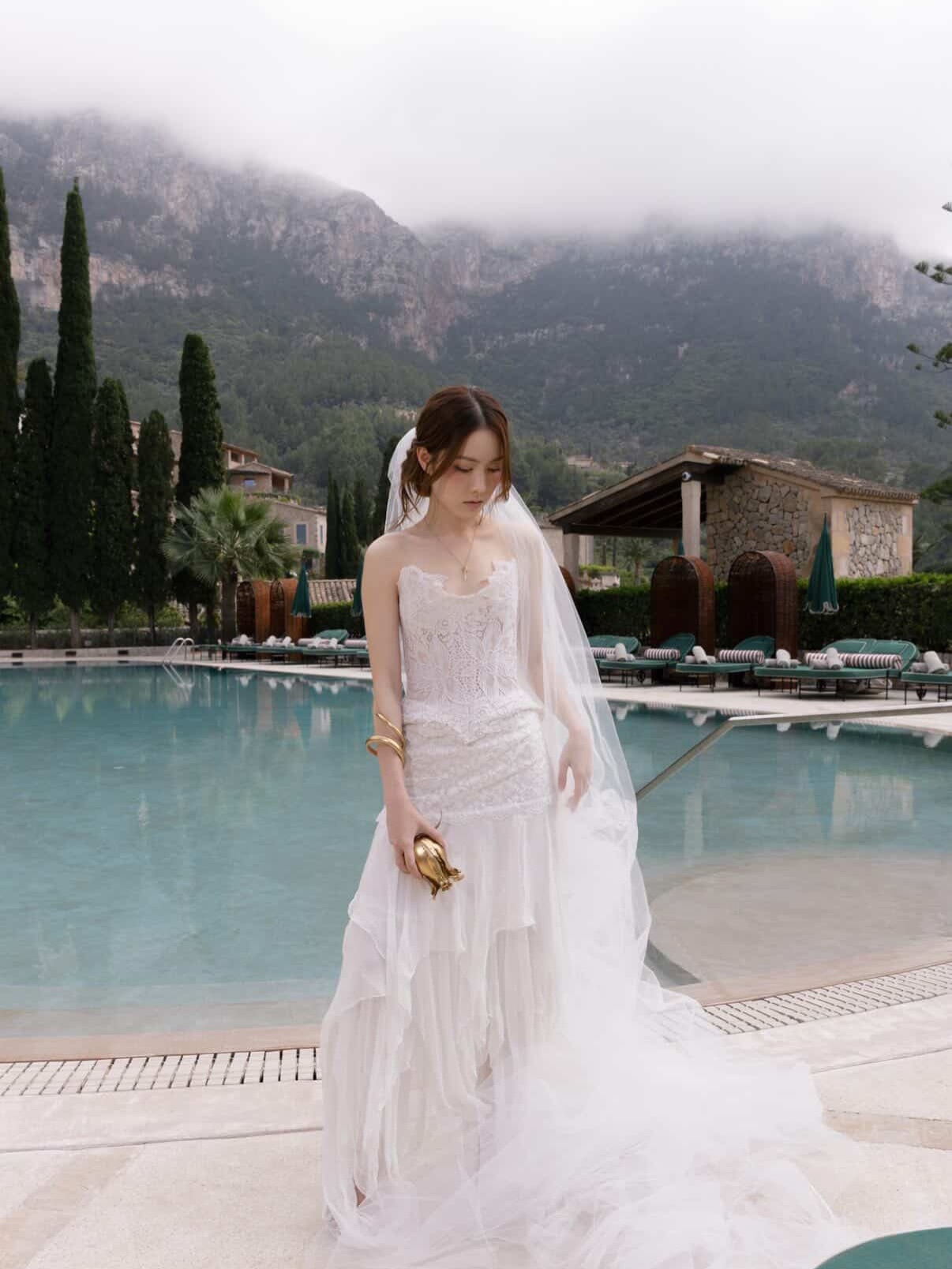 .
Beautiful real bride Tien @thuythuytien_ , wearing the Imogen corset and bespoke Lyra silk skirt for her pre-wedding shoot in Mallorca.
After discovering the Imogen corset on Instagram, Tien and I worked together remotely through a series of calls and video consultations to create a look that felt entirely her own.
Crafted from rare vintage Nottingham lace layered over structured corsetry, Imogen carries a rich history of English lace-making, balancing strength and softness in equal measure. Paired with the custom made Lyra skirt, with its cascading layers of silk and effortless movement. A look that honours craft and embraces an ethereal sense of beauty.
.
Photography @hanguyenphoto
HMUA @kristianabeauty
Dress @julita_ldn_bride
.
.
.
.