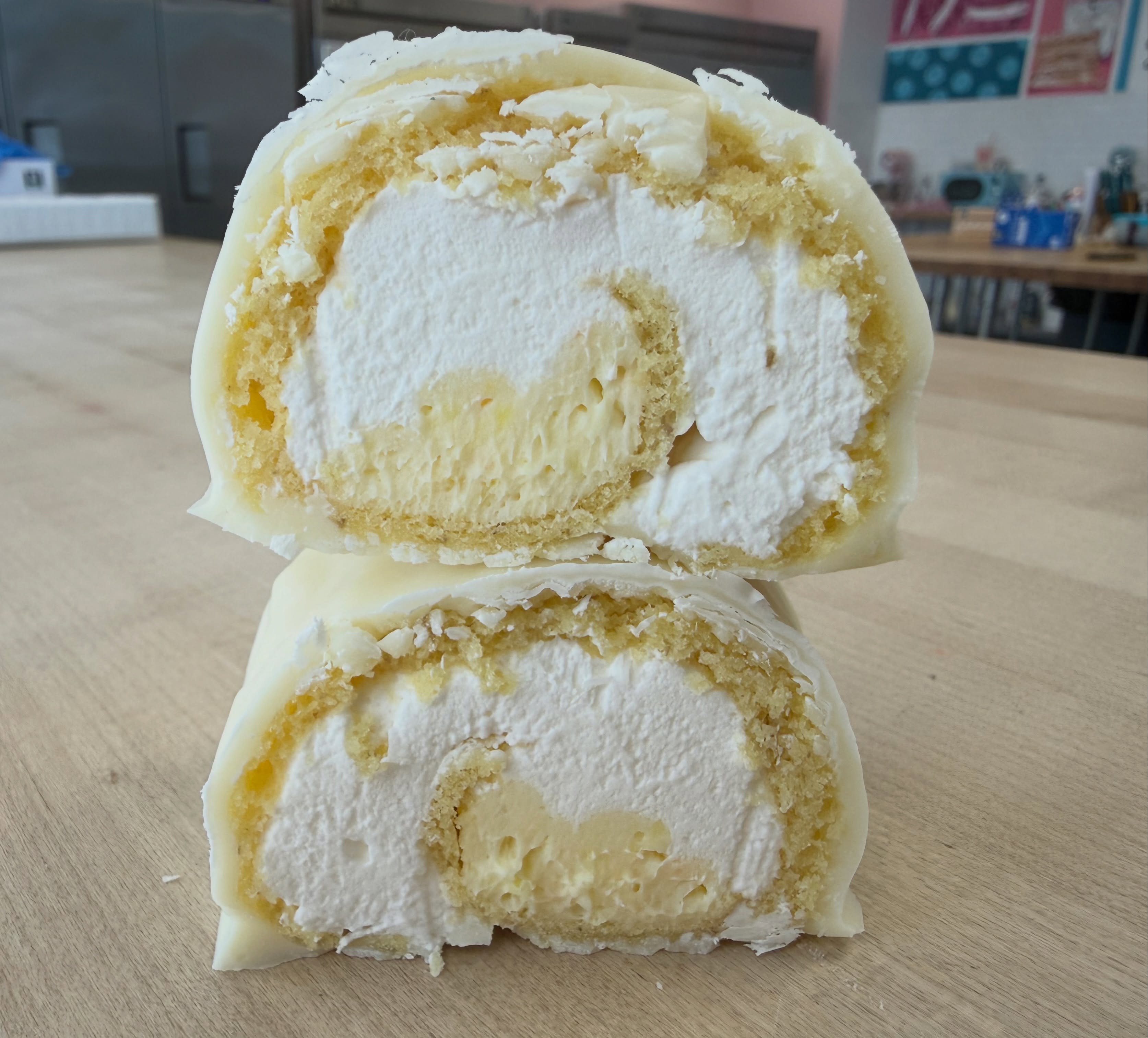 LAST CHANCE TO GRAB THESE!! We are making room for NEW products!!
Calling all banana pudding lovers… this one is for YOU!! 🤩
Introducing our BRAND NEW BANANA PUDDING ROLLS!!
Made with our classic gluten-free banana cake filled with creamy banana pudding and whipped cream, then rolled into our delicious signature white chocolate coating.
This dessert is packed with rich banana flavor and the perfect creamy sweetness in every bite! 💛
NOW AVAILABLE in our showcase while supplies last!!