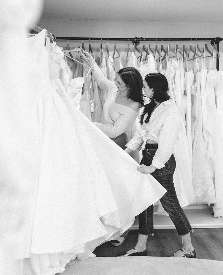 Your Bridal Stylist✨️
We are sisters Hannah & Megan (we will let you figure out which ones older).
Being bridal shop owners and stylists is our dream job and we feel so lucky to do what we do. It is important to us that our brides can feel like they know us and relate to us on a more personal level. We never want to feel like "sales women" because we are more than that. And quite frankly not very good at being "salesy". It gives us the ick!
So here is a little bit about us:
- We love the odd tequila shot.
- We both have some form of dyslexia. Spelling mistakes are a common problem (Hannah more than me) 😉 But our mum quite often grammar checks everything for us. So we do apologise for the odd email with spelling mistakes. We are only human right?
- We talk everyday. On the phone, facetime, emails. And when we don't see eachother for a few days it makes us sad.
- We are eachothers best friend.
- Both over thinkers.
- Hannah is a cat person. I (Megan) am a dog person.
- Hannahs guilty pleasure is trash TV and often has a new series on the go.
- I watch the same films over and over.
- We both have young children and our biggest achievement (aside from the kids themselves, is being able to be present at every milestone in their life because of our job).
There is so much more we could tell you about us but we hope this gives you a little insight into who we are🤍
Vicki's Bridal Boutique
📍Tenterden, Kent.
@hannahpartridgephotography
