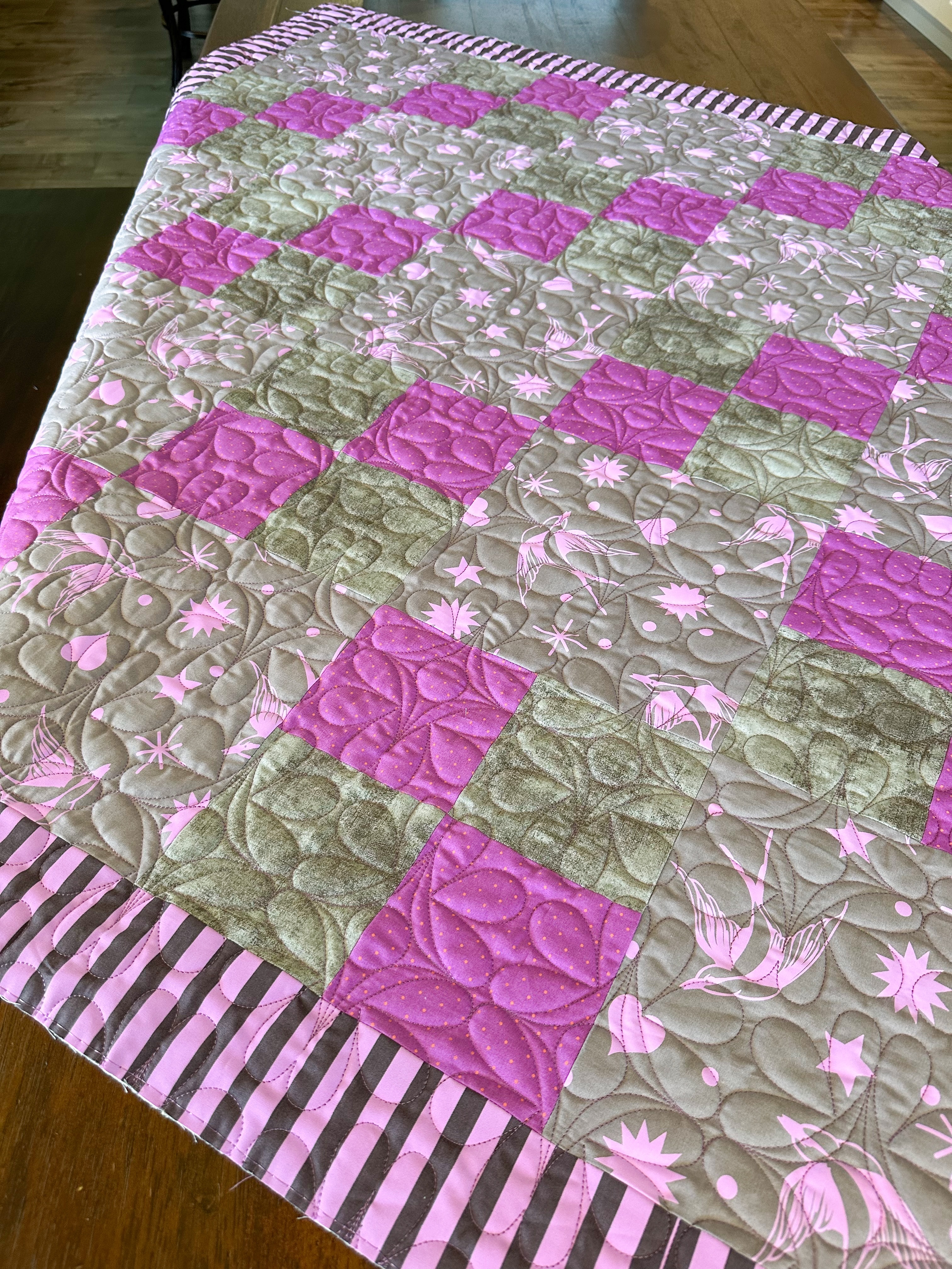 ✨ Sometimes a quilt is just too beautiful not to share again. ✨
I originally shared this gorgeous quilt last year, but while going through photos I found these images and knew I had to post them again! 💕 The soft pinks, purples, warm taupe tones, and striking checkerboard layout create such a timeless, elegant look.
This stunning quilt was pieced by my talented client Kim, @kim.morrison.5686322 and I had the pleasure of adding the finishing touch with the Demure longarm quilting design by @longarmleague. The flowing texture adds beautiful movement across every block while enhancing the fabric prints without overwhelming the quilt design.
As a professional longarm quilter in St. George, Utah, I absolutely love helping quilters transform their quilt tops into finished heirlooms. From modern quilts and baby quilts to traditional patchwork designs, custom quilting and edge-to-edge quilting can bring so much extra dimension and texture to your work.
The combination of the delicate quilting, bold pink and purple accents, and beautifully coordinated fabrics makes this one a quilt I could admire for hours. Sometimes the best quilts deserve a second moment in the spotlight! 🌸
If you’re looking for longarm quilting services in St. George, Washington, Santa Clara, Ivins, Southern Utah, or by mail, I’d love to help finish your next quilt. 🥰
#LongarmQuilting #StGeorgeUtah #tulapink #demurepanto #omjquilting
💕 Which detail catches your eye first—the vibrant pink squares or the gorgeous quilting texture?🥰