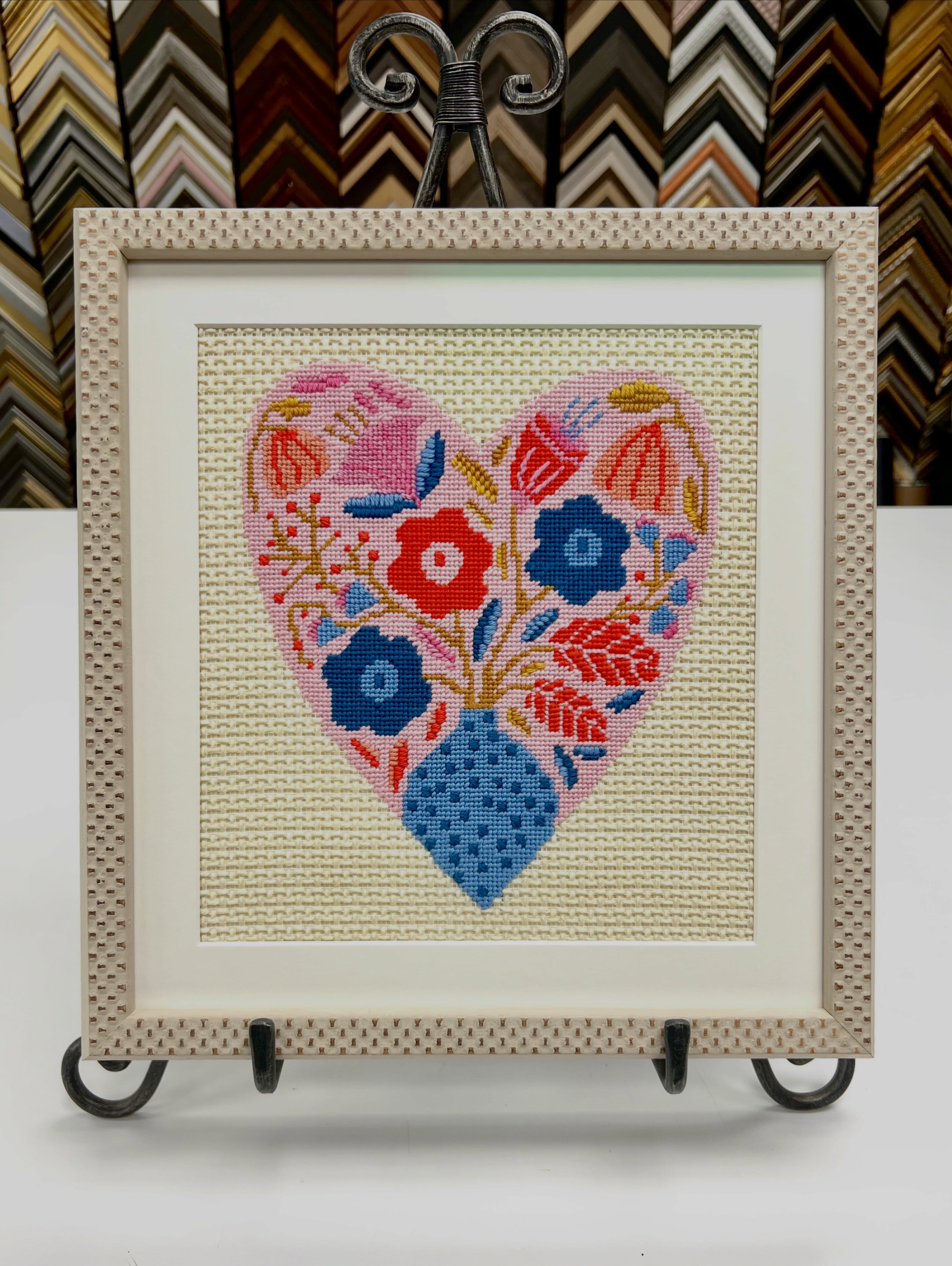 We 💖 framing your needlework art!
This beautiful cross stitch heart was stretched and pinned into place, then carefully housed in the white variant of @fotiouframes’s Velato collection.
Old or new, bring your fabric projects to us for framing so we can insure they remain pretty and protected for years to come. 🖼️
#crossstitch #crossstitchframe #customframing #needlework #artframing
