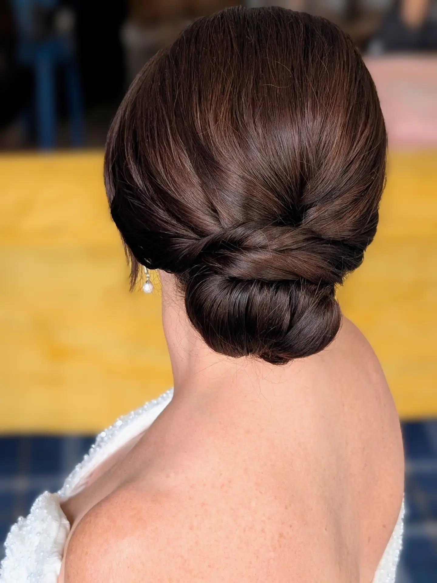 I absolutely loved creating this elegant twisted low bun for Kim. The soft, polished details complemented her gorgeous dress so beautifully, creating a timeless look that felt effortlessly sophisticated from every angle. Seeing everything come together so perfectly is one of the things I love most about what I do.
#BridalHair #WeddingHairStylist #BridalBeauty #ElegantUpdo #HairArtist