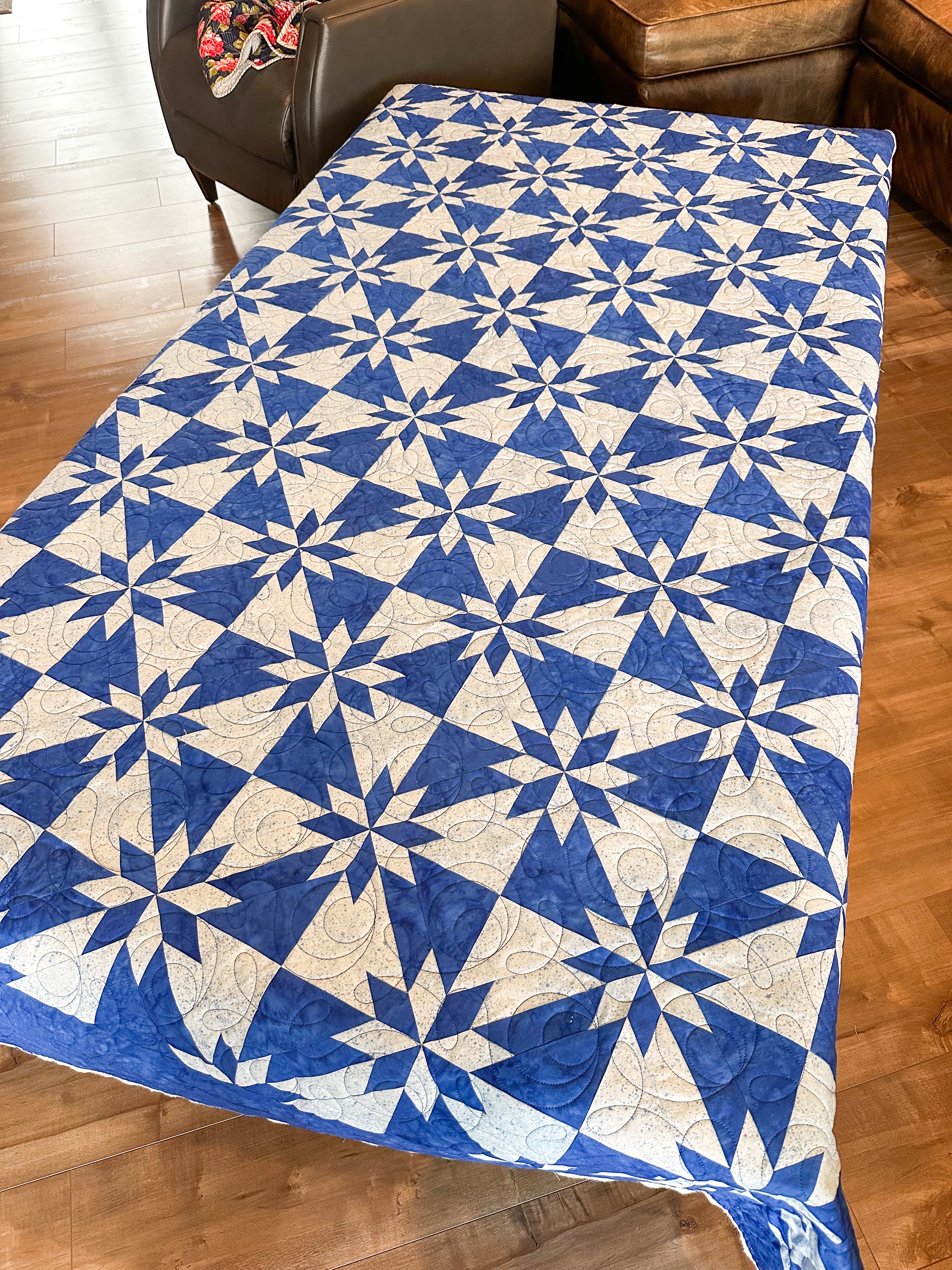 ✨ Classic quilt patterns never go out of style. ✨
This stunning Hunter’s Star quilt, beautifully pieced by my client Linda, is a perfect reminder of why traditional quilts continue to capture our hearts. The striking blue and white color palette makes those star points shine, and I finished it with the Ginger Snap pantograph, adding just the right amount of movement and texture without taking away from the timeless design.
One of my favorite parts of longarm quilting is helping bring each maker’s vision to life. From heirloom-inspired quilts like this one to modern masterpieces, every quilt deserves a beautiful finish that will be loved for generations. 💙⭐
If you’re looking for a longarm quilter in St. George, Utah, I’d love to help you finish your next quilt! I accept local drop-offs and mail-in quilts from quilters across the country.
#HuntersStarQuilt #LongarmQuilting #EdgeToEdgeQuilting #blueandwhitequilt #StGeorgeUtah