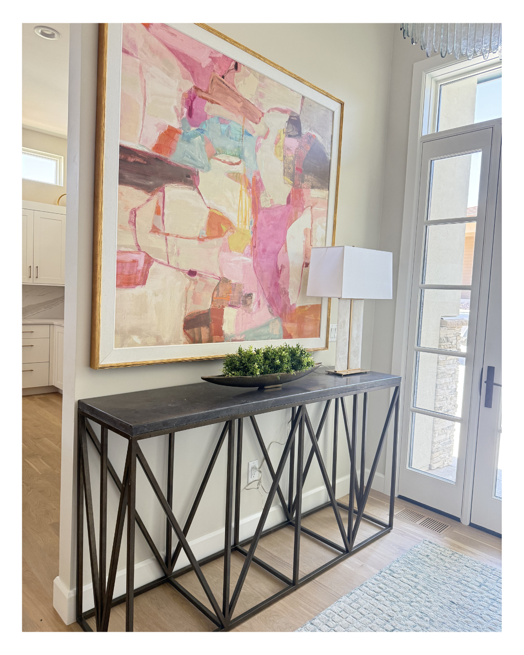 A neutral home provides the perfect backdrop for a statement piece of artwork. Adding colorful art to an entryway instantly creates interest, personality, and a warm welcome for anyone who walks through the door.
We love using artwork to introduce color, tell a story, and set the tone for the rest of the home. Sometimes, one beautiful piece is all it takes to transform a simple space into something memorable.
#JennyLeeDesigns
#DowntownMonument
#InteriorDesign
#InteriorDecor
#DecorIdeas