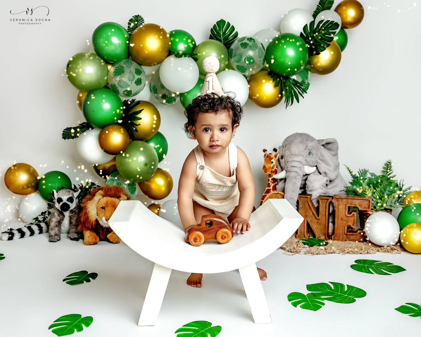 🦁🌿 ROAR! Abhay is officially ONE! 🌿🦁
What better way to celebrate a first birthday than with a wild jungle adventure? 🐘🦒🦁
Sweet Abhay joined me at my Swindon studio for his Jungle-Themed Cake Smash & First Birthday Photoshoot, and he absolutely stole the show! From riding his little wooden bike and exploring the jungle scenery to sitting proudly amongst his animal friends, every moment was filled with curiosity, personality and those adorable expressions that make this age so special.
One-year-olds are full of wonder. They are learning to stand, explore, smile, laugh and show us their unique little personalities. That is exactly why first birthday sessions are some of my favourites to photograph. They capture so much more than a birthday — they preserve an incredible milestone in your child's story.
I absolutely loved creating this custom jungle setup with vibrant green and gold balloons, tropical leaves, safari animals and plenty of opportunities for fun. Just look at those gorgeous curls and those big curious eyes! 💚
Your baby's first year passes by in the blink of an eye. One moment they are tiny newborns curled up in your arms, and before you know it, they are celebrating their very first birthday.
🎂 Cake Smash Sessions Include:
✨ Beautiful birthday portraits
✨ Custom themed setup
✨ Family photos option
✨ Cake smash fun
✨ Memories you'll treasure forever
If your little one is turning ONE soon, now is the perfect time to book their Cake Smash Session. I offer fully styled birthday photoshoots in my Swindon studio with a variety of themes tailored to your child.
📍 Swindon Cake Smash Photographer
📸 First Birthday • Cake Smash • Baby Photography • Family Photography
🎉 Booking now for upcoming birthdays
Don't let this milestone pass by without capturing it. Contact me today and let's create something magical for your little one's first birthday celebration! 💚🦁🐘🦒
#cakesmashswindon #firstbirthdayphotoshoot #cakesmashphotography #swindonphotographer