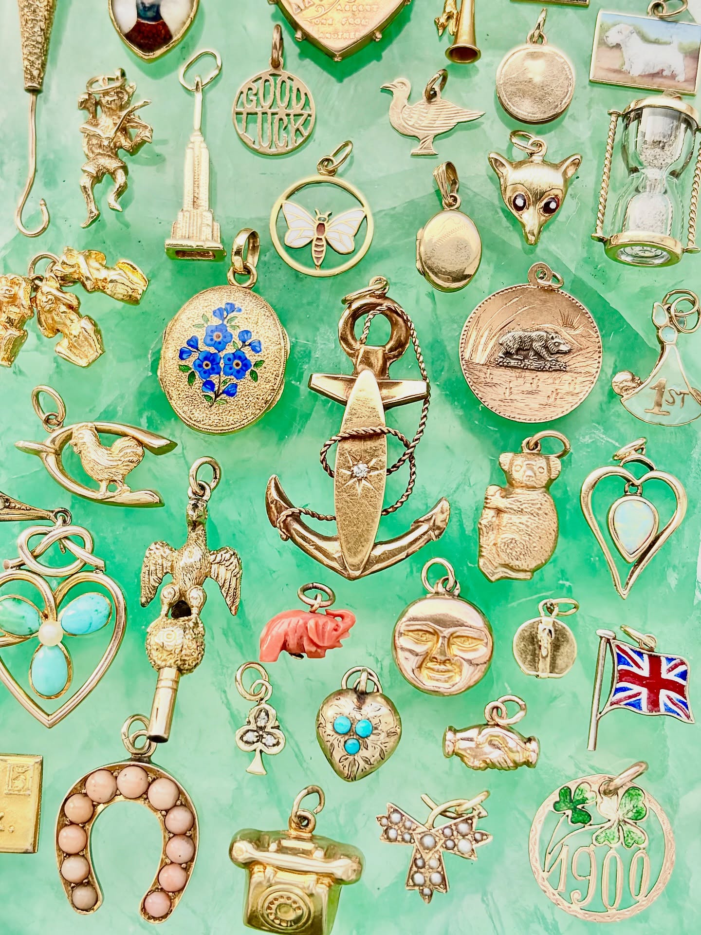 🌞 Summertime charms 💛 They’re not much help during a heatwave but they do provide a lot of distraction ☺️ Here’s just a selection of what we currently have available online ✨ Which catches your eye? 😍 #kategoldcharms #charmsofinstagram #charms #goldcharms #charmcollection