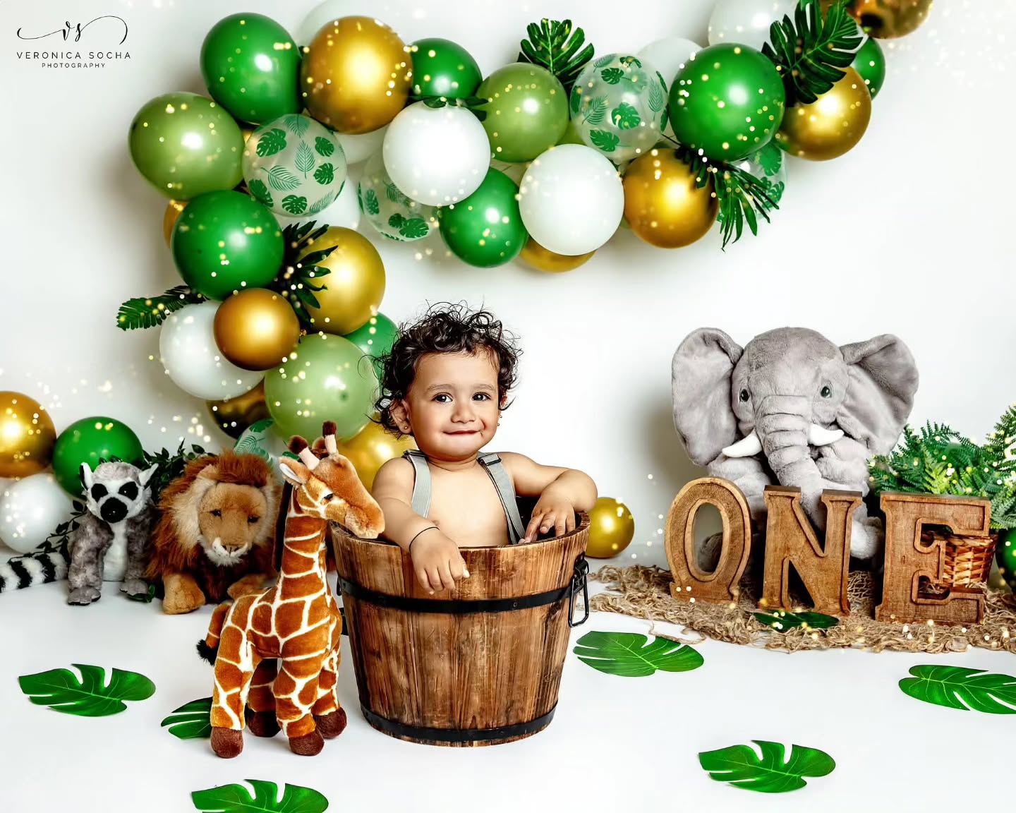 🦁🌿 ROAR! Abhay is officially ONE! 🌿🦁
What better way to celebrate a first birthday than with a wild jungle adventure? 🐘🦒🦁
Sweet Abhay joined me at my Swindon studio for his Jungle-Themed Cake Smash & First Birthday Photoshoot, and he absolutely stole the show! From riding his little wooden bike and exploring the jungle scenery to sitting proudly amongst his animal friends, every moment was filled with curiosity, personality and those adorable expressions that make this age so special.
One-year-olds are full of wonder. They are learning to stand, explore, smile, laugh and show us their unique little personalities. That is exactly why first birthday sessions are some of my favourites to photograph. They capture so much more than a birthday — they preserve an incredible milestone in your child's story.
I absolutely loved creating this custom jungle setup with vibrant green and gold balloons, tropical leaves, safari animals and plenty of opportunities for fun. Just look at those gorgeous curls and those big curious eyes! 💚
Your baby's first year passes by in the blink of an eye. One moment they are tiny newborns curled up in your arms, and before you know it, they are celebrating their very first birthday.
🎂 Cake Smash Sessions Include:
✨ Beautiful birthday portraits
✨ Custom themed setup
✨ Family photos option
✨ Cake smash fun
✨ Memories you'll treasure forever
If your little one is turning ONE soon, now is the perfect time to book their Cake Smash Session. I offer fully styled birthday photoshoots in my Swindon studio with a variety of themes tailored to your child.
📍 Swindon Cake Smash Photographer
📸 First Birthday • Cake Smash • Baby Photography • Family Photography
🎉 Booking now for upcoming birthdays
Don't let this milestone pass by without capturing it. Contact me today and let's create something magical for your little one's first birthday celebration! 💚🦁🐘🦒
#cakesmashswindon #firstbirthdayphotoshoot #cakesmashphotography #swindonphotographer #babyphotography firstbirthday junglecakesmash safaricakesmash wiltshirephotographer birthdayphotoshoot babyphotographerswindon cakesmashsession
