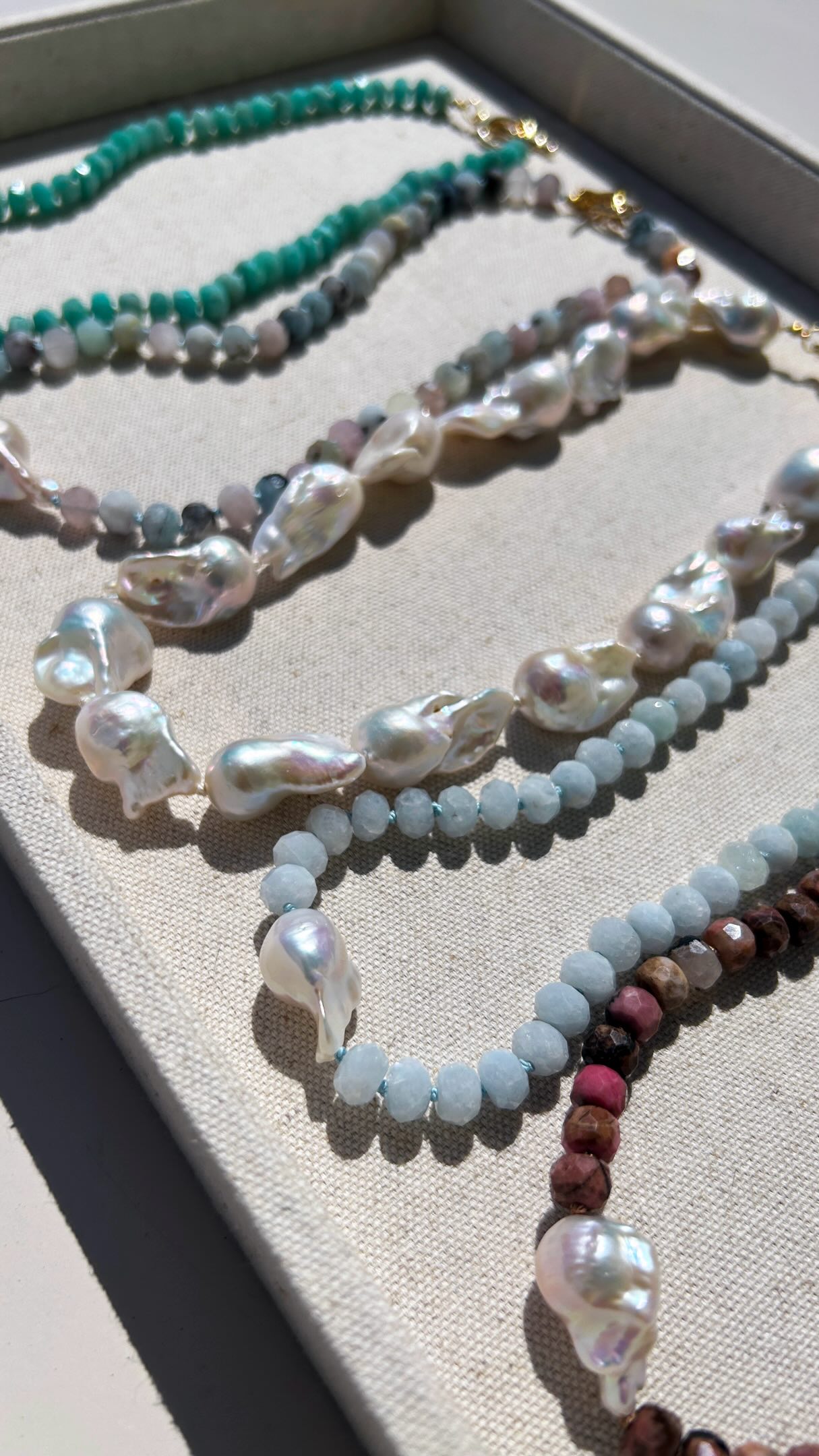 Which is your favorite? I’ve been surprised all around. From gemstones alone, I loved the amazonite first. Then I made the samples and I loved the rhodonite best (and kept one for myself)… considered dropping morganite color altogether, then started receiving requests for it. Thought aquamarine would sell out first—because, blue—but morganite & all-pearl are in the lead. 😅 do you like 1, 2, 3, 4, or 5?
P.S. I had a mini meltdown yesterday over social media so I’m proud of myself for getting back on today. It can be hard smiling for the camera. Especially if you’re like me & you work from a home office. I never really feel camera-ready. But I want you all to see these special pieces. 🫶🏼 Drop a heart if you can relate!
#jewelrydesigner #handmadejewelry #madeinrhodeisland | This is a limited edition style which means I only sourced enough beads for a handful of each and they may not be restocked, so grab your favorite color (or colors…) soon!