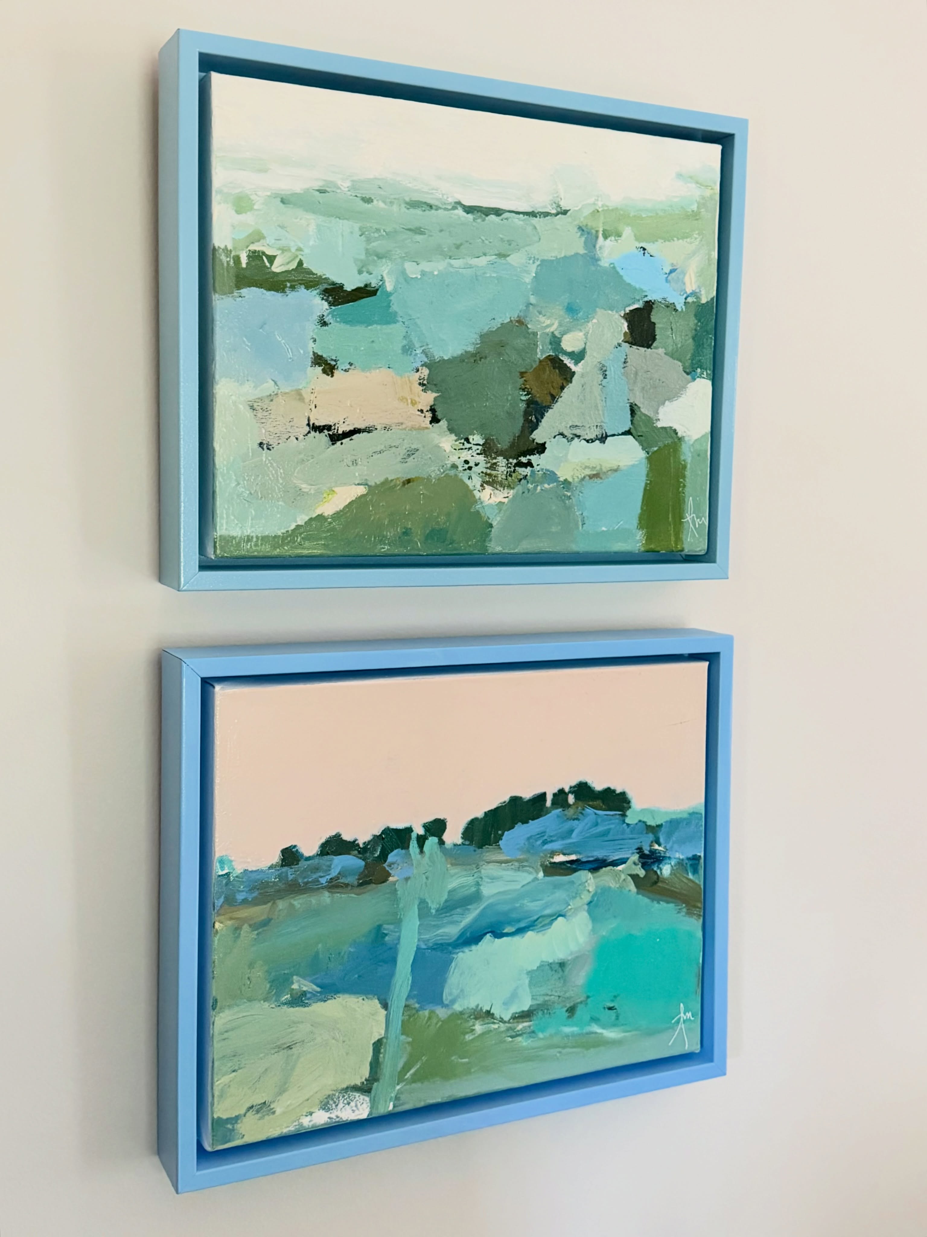 There’s something about layering two complementary pieces that instantly makes a space feel so collected and intentional. These two by Tanner Rees Munson are the perfect pair.
I love everything about them…the calming blues and greens, the loose, layered brushstrokes, and the hand-painted blue frames that finish each piece so beautifully. They’re stunning on their own, but together they create a real statement.
Even better? Both pieces are part of the Summer Sale and are 30% off through July 19. If you’ve been looking for artwork that brings color, texture, and a sense of calm to your home, these might just be the ones. 💙