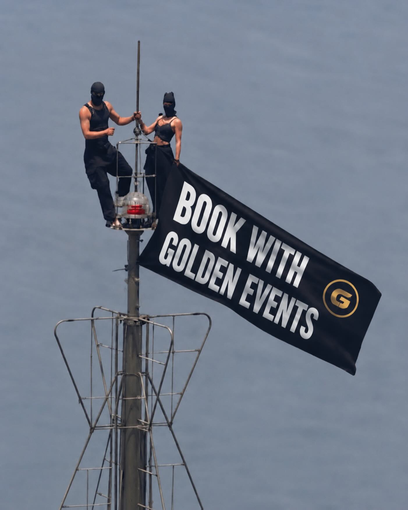 Climbing to the top of the Empire to spread the message 🤳 Book now and make your event memorable!