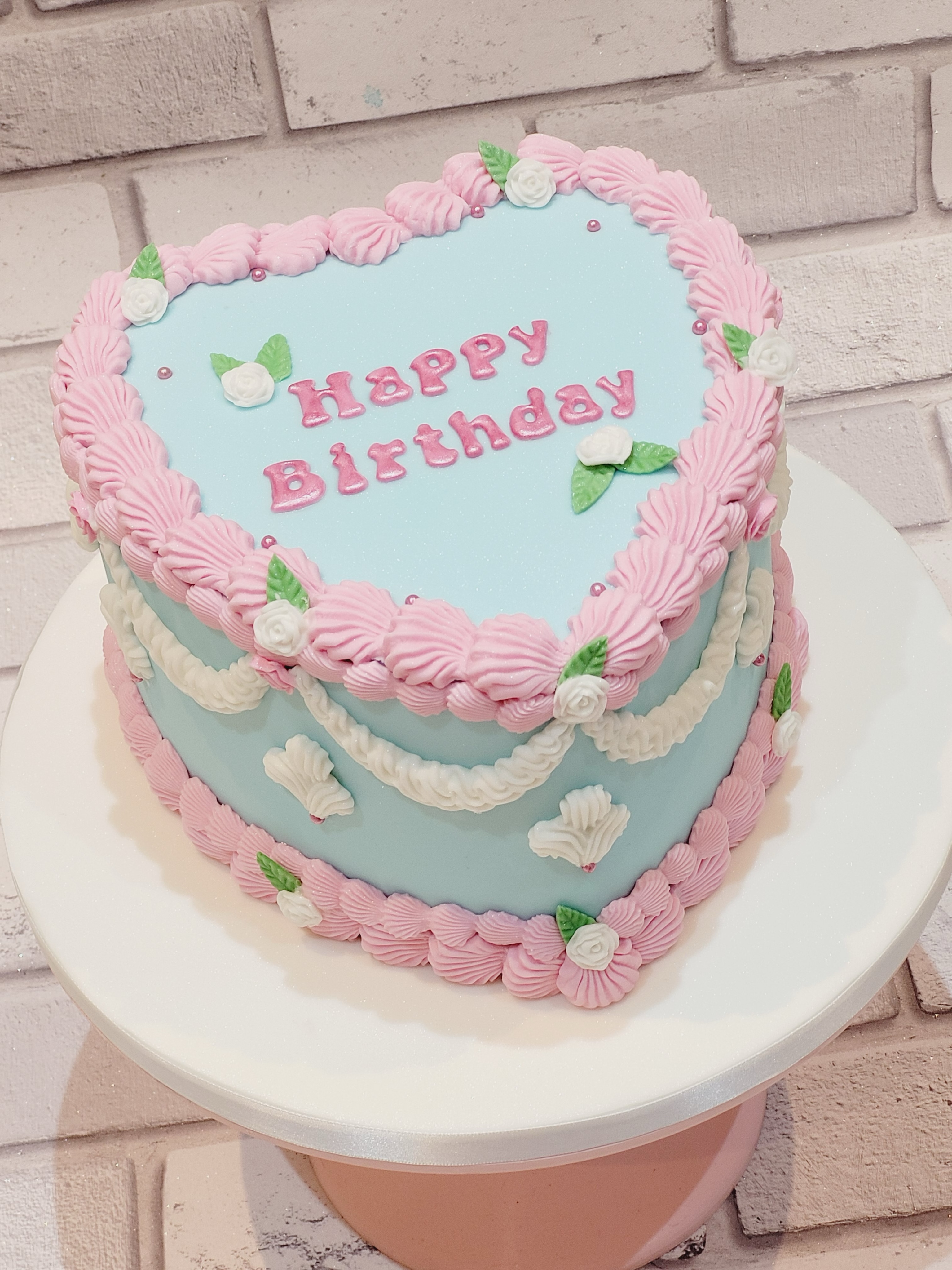💕 One of our popular heart cakes, finished with a vintage twist! 💕
Our heart cakes continue to be one of our most requested designs, and it’s easy to see why! This one features a soft pastel blue finish, delicate pink vintage piping, dainty sugar roses, and elegant detailing to create a timeless birthday centrepiece.
Every cake is handcrafted and can be personalised with your choice of colours, message, and flavour to make your celebration truly unique.
Whether you’re celebrating a birthday, anniversary, or another special occasion, our heart cakes are guaranteed to make an impression. 🎂🌸
💬 What colour combination would you choose for your perfect heart cake? Let us know in the comments!
#HeartCake #VintageCake #BirthdayCake #ButtercreamCake #celebrationcake