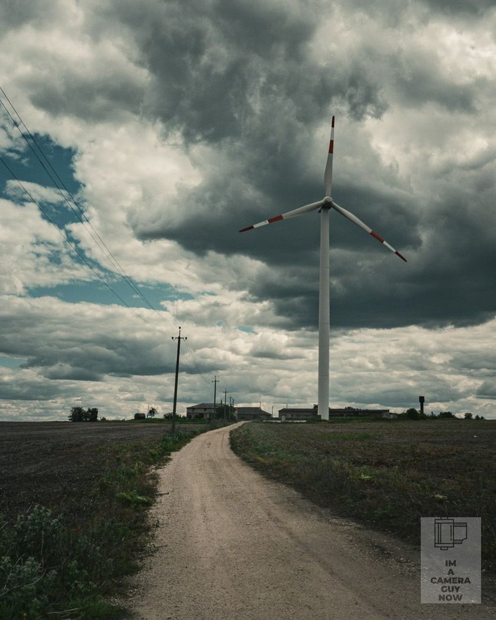 My recent journey to Moldova, Transnistria, Ukraine and Romania.
Somewhere between Soroca and Chernivtsi, Moldova. The countryside out here is flat enough that a single wind turbine can dominate the whole horizon. The road just points straight at it.
#Moldova #CountrysideViews #LandscapePhotography