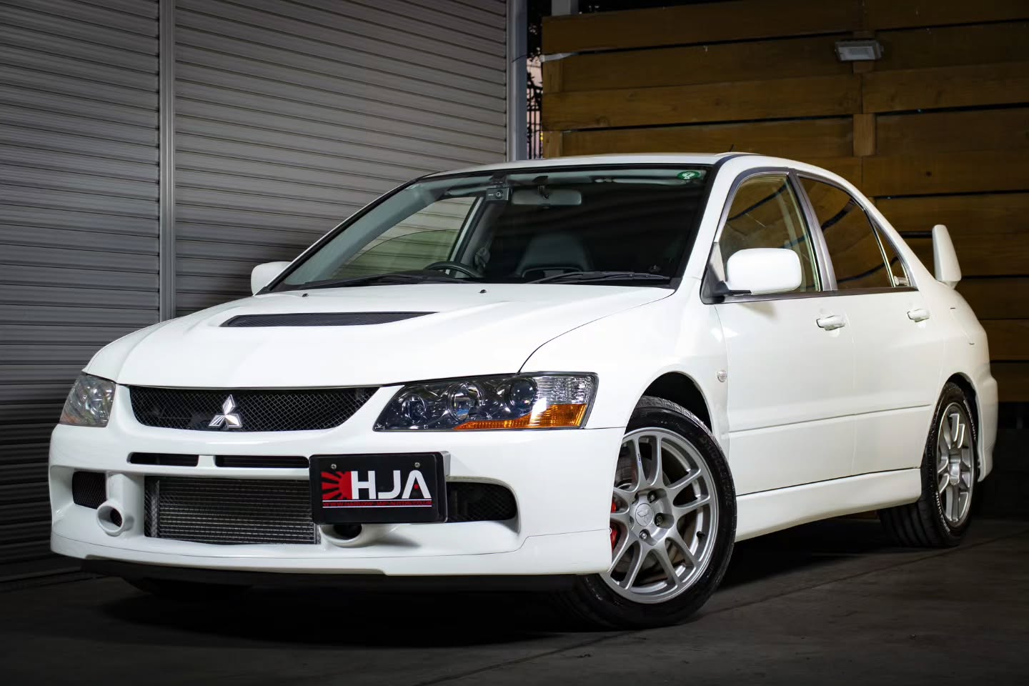• 06/2005 Mitsubishi Lancer Evolution 9 GSR
• One owner from new
• 21,350km / approx. 13,266 miles
• Japanese auction grade 4.5
• No accident history
• Original paint
• Rust-free chassis
• Manual and warranty documents included
HJA are delighted to offer this very clean and original Mitsubishi Lancer Evolution IX GSR, now secured and currently arriving from Japan.
This is a stunning example showing just 21,350kms / approx. 13,266 miles from new. It has had one owner from new in Japan and has been awarded a strong Japanese auction grade of 4.5.
The car remains in very original, unmodified condition throughout and still retains its original paint. The chassis is rust free, the body presents very well and the interior has clearly been well cared for.
This is exactly the sort of Evo we like to buy: low mileage, standard, honest and properly looked after in Japan. It comes with its manual and warranty documents and features desirable factory equipment.
The Mitsubishi Lancer Evolution IX remains one of the most sought-after models in the Evo range, combining the legendary 4G63 engine with sharp handling, 4WD traction and proper driver involvement.
Clean, unmodified Evo IXs are now becoming very difficult to source, especially with one-owner history, low mileage and this level of condition.
This vehicle will be supplied UK registered and ready for the road, with all necessary UK conversions completed to HJA’s usual high standard.
Secure now with a 10% deposit until ready for collection.