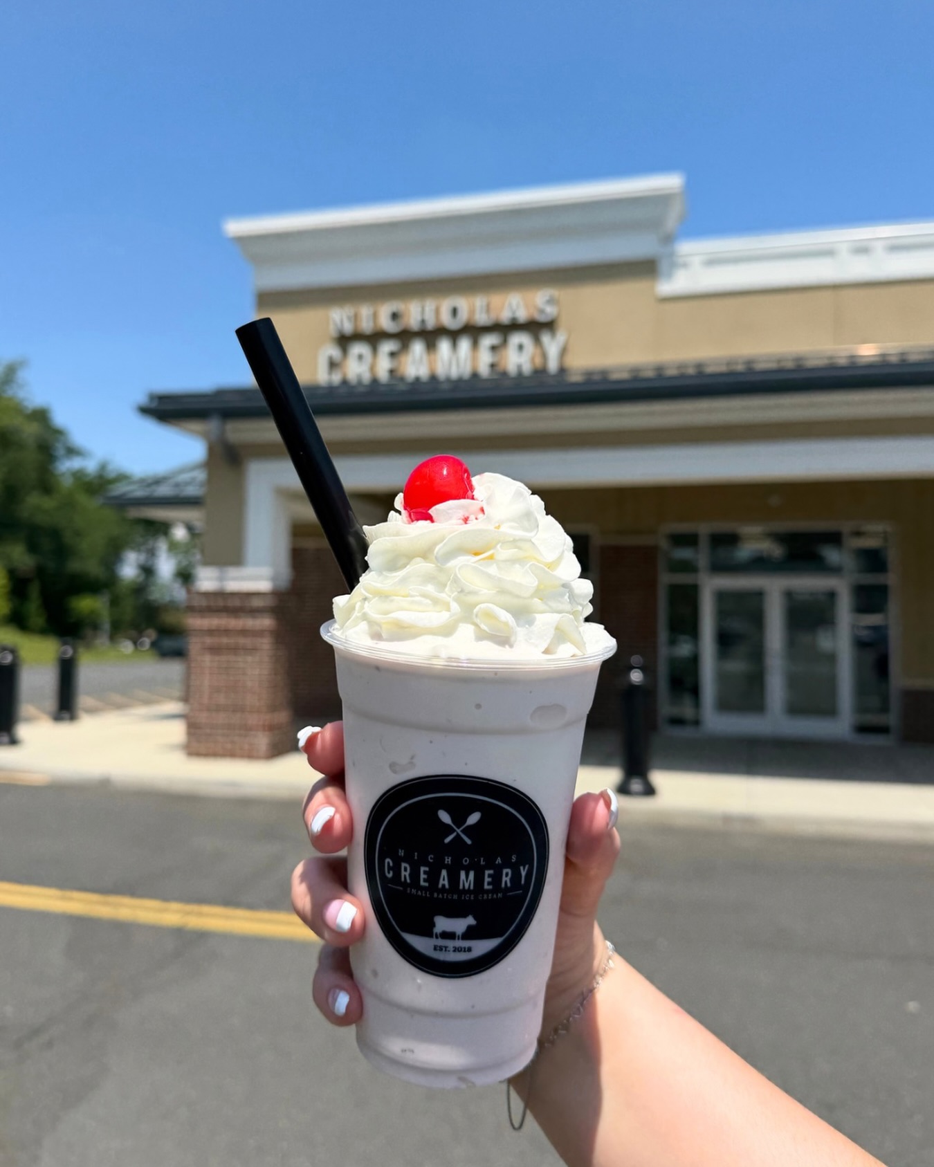 Does your Sunday need something over-the-top delicious? Start sippin’ a Cherry Vanilla milkshake filled with HOMEMADE Cherry Vanilla ice cream, fluffy whipped cream, and a cherry on top! 🍒✨
We are shakin’ every day 11am-10pm at 84 First Avenue in ATLANTIC HIGHLANDS , 586 River Road in FAIR HAVEN, 1201 Sycamore Ave in TINTON FALLS, 444 Ocean Ave in LONG BRANCH, 2435 Route 34 in WALL, 224 Grand Ave in NORTH BRUNSWICK and 1500 Route 35 in MIDDLETOWN! 🥤
#nicholascreamery #bestmilkshakes #cherryvanilla