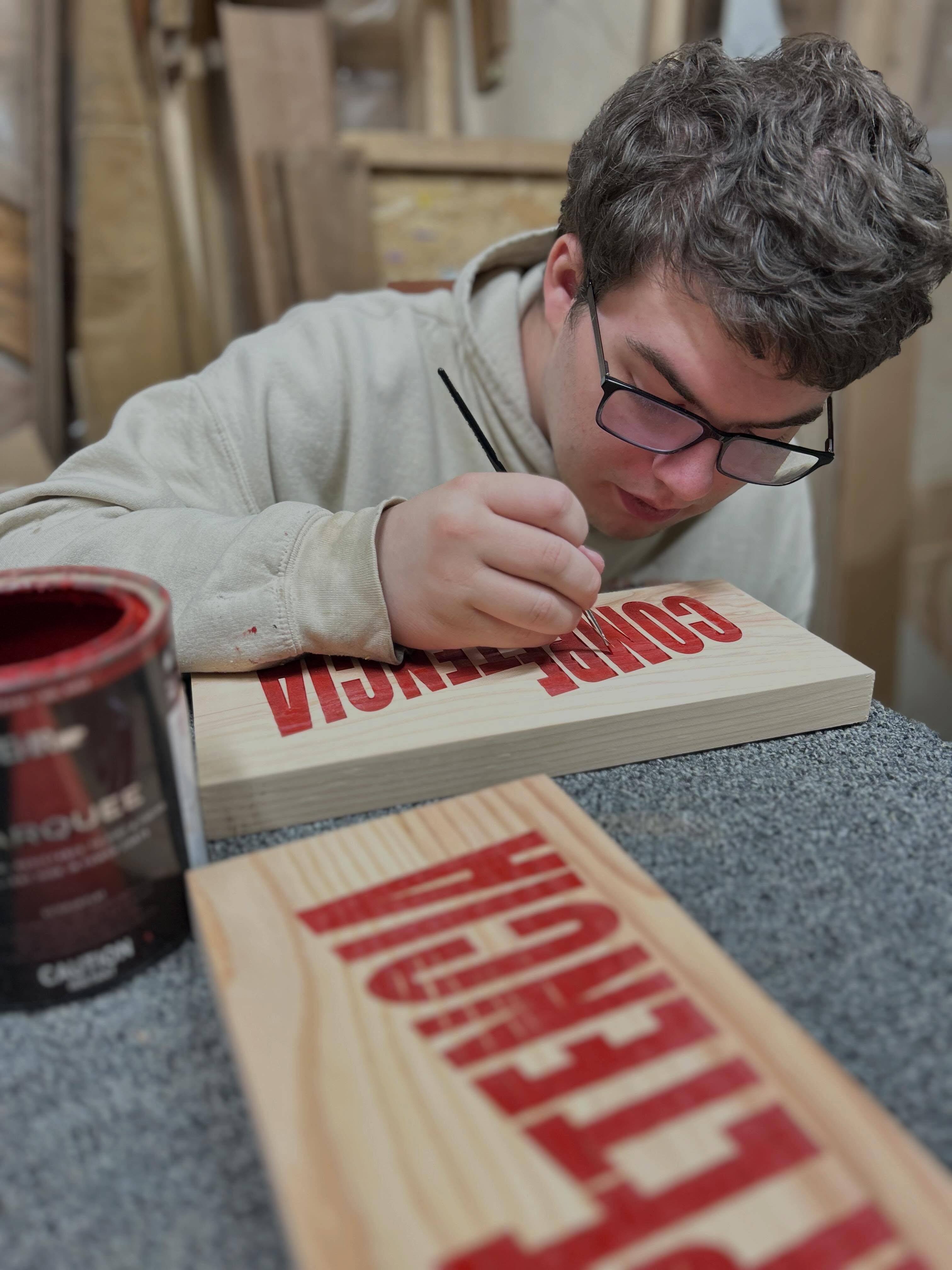 Reuben finishing off this month’s thank you plaques in prep for @creativemorningsvancouver. ‘Competencia’ means Competition in Spanish. Excited to hear @adri.musix perform and @soldiana speak tomorrow!