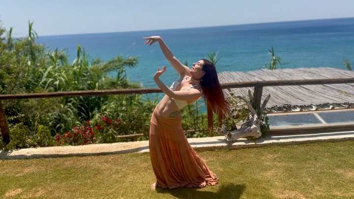 Whenever I lead retreats in foreign lands, I like to find some way to give back to the land and the culture. To meet it deeply rather than to simply skim the surface.
I found this glorious and heart wrenching traditional Greek lament sung by Alkyone right before my trip to Crete and knew I wanted to bring it in to the retreat. When I translated the lyrics it fit our theme perfectly. It is about the longing and yearning for the love of the mother (a mother oftentimes symbolizing the lover or beloved in Greek songs), arising from a place of feeling orphaned, or cast out of the beloveds heart. I think every soul feels this to some degree. This is the core wounding that arrives with us into these bodies. This sense that we are separate from something, that we are somehow incomplete and we are seeking to return to that source, to that sense of completion.
Throughout our retreat I kept referring to the sea as the representation of that source, of loves all-encompassing expanse, and each of us a river following its unique path, overcoming its unique obstacles to arrive and merge back with the sea. In Greek there is a reference to the sea as Thalassa, a reference that insinuates the sea as a feminine divine entity. Many Greek love songs refer to Thalassa, or merging with the sea as a metaphor of merging with a beloved.
This was a short dance I made for our retreat as an offering to the sea, and the souls journey and longing for union. I find that our sensual nature as women particularly is the North Star that guides us home. Through our dance we merge, through our feeling body we merge, through the natural and unbridled overflow of our hearts we merge with it all 🕊️
#beloved #bellydance #devotionaldance #feminineembodiment