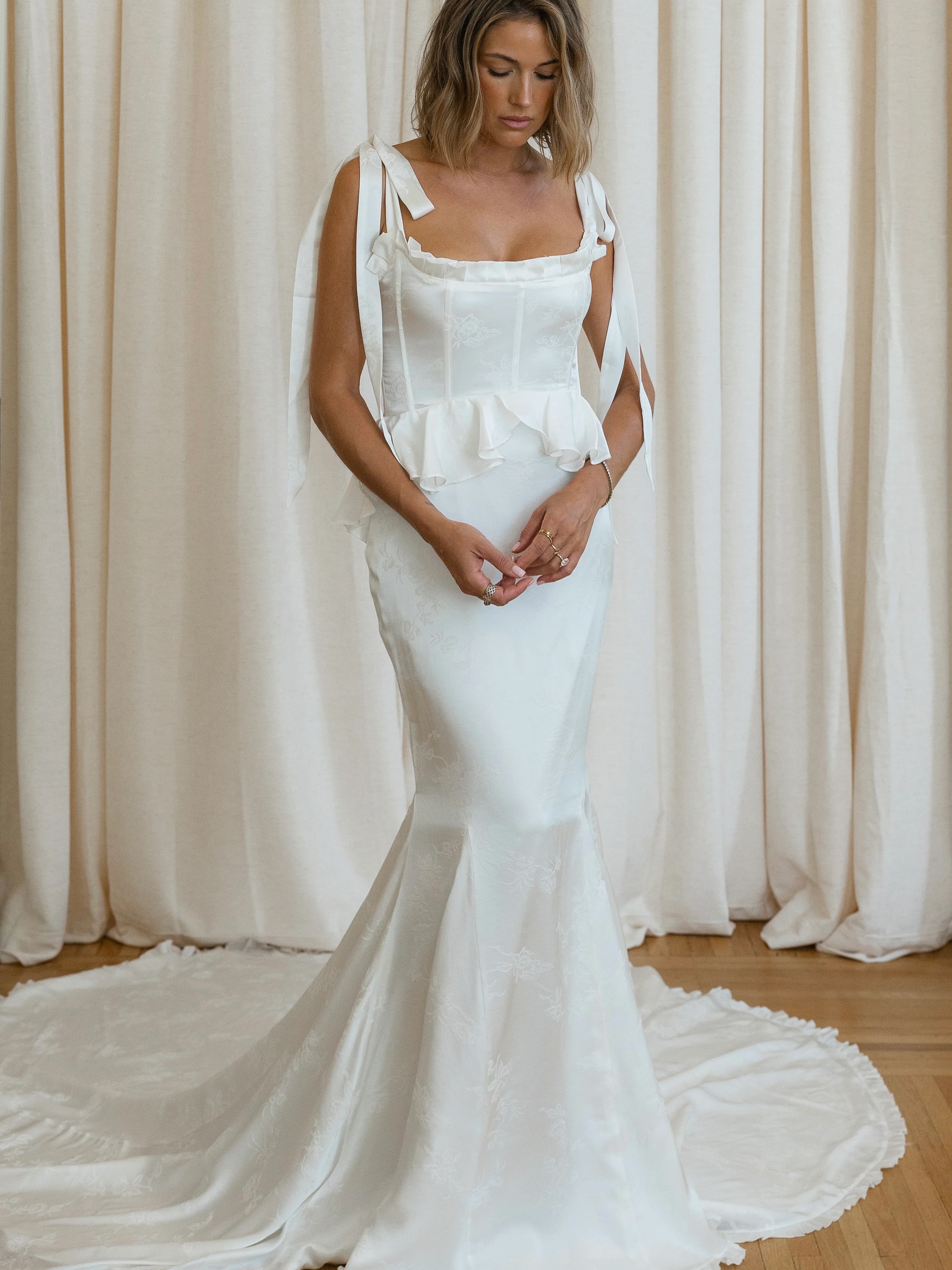 Melody. The sweetest of silk gowns. This and other Daughters of Simone gowns are exclusively available at Unbridaled.
