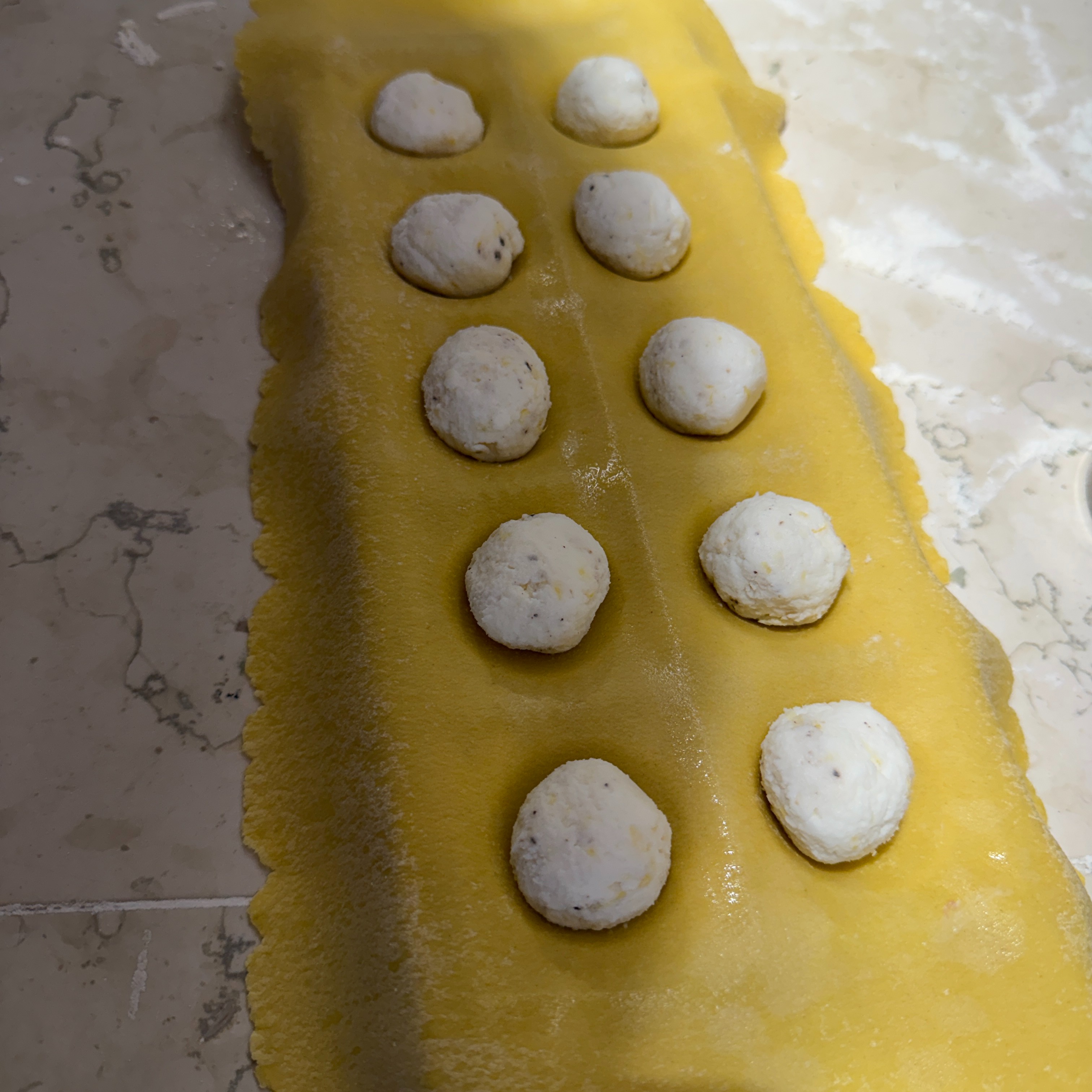 On the table tonight Wonderful little ravioli filled with ricotta from the neighbor. This ingredient is magic from nature