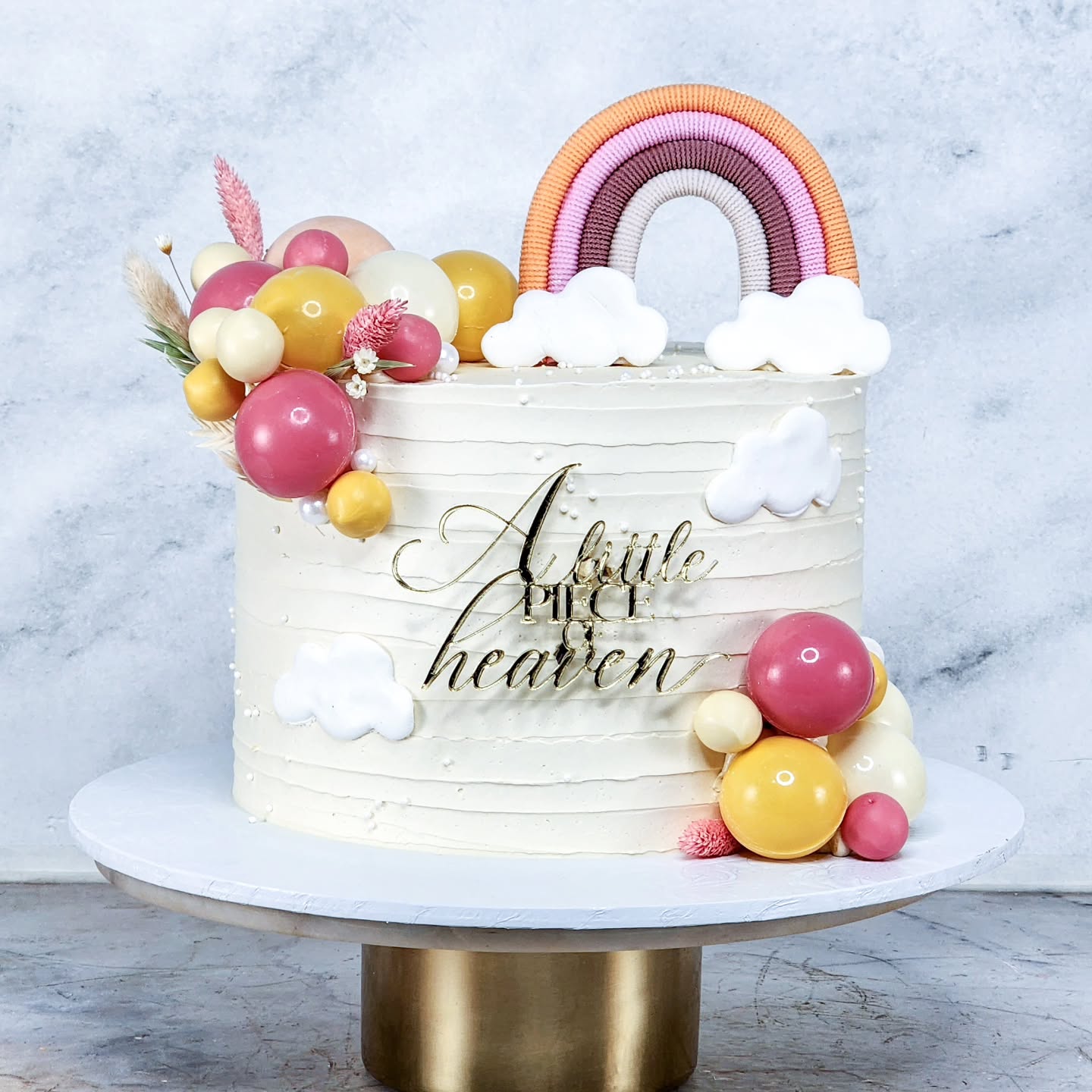 A little piece of Heaven
Shiny chocolate Spheres with creamy buttercream and a classic vanilla hot milk sponge.
#BabyShowerCake #Babyshowertheme #ChocolateSpheres #2026Bakes #Marlenebakes