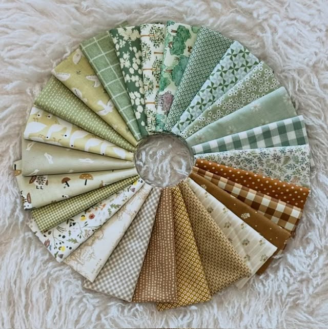 This bundle is for all the nature lovers amongst us! Birds, trees, flowers and mushrooms, combined with some ginghams and spots, all come together in calming palette of greens and brown.
Each bundle contains 26 fabrics, 20cm x half width of fabric.
#cuttingcloth #patchwork #beautifulfabrics #fabricbundle