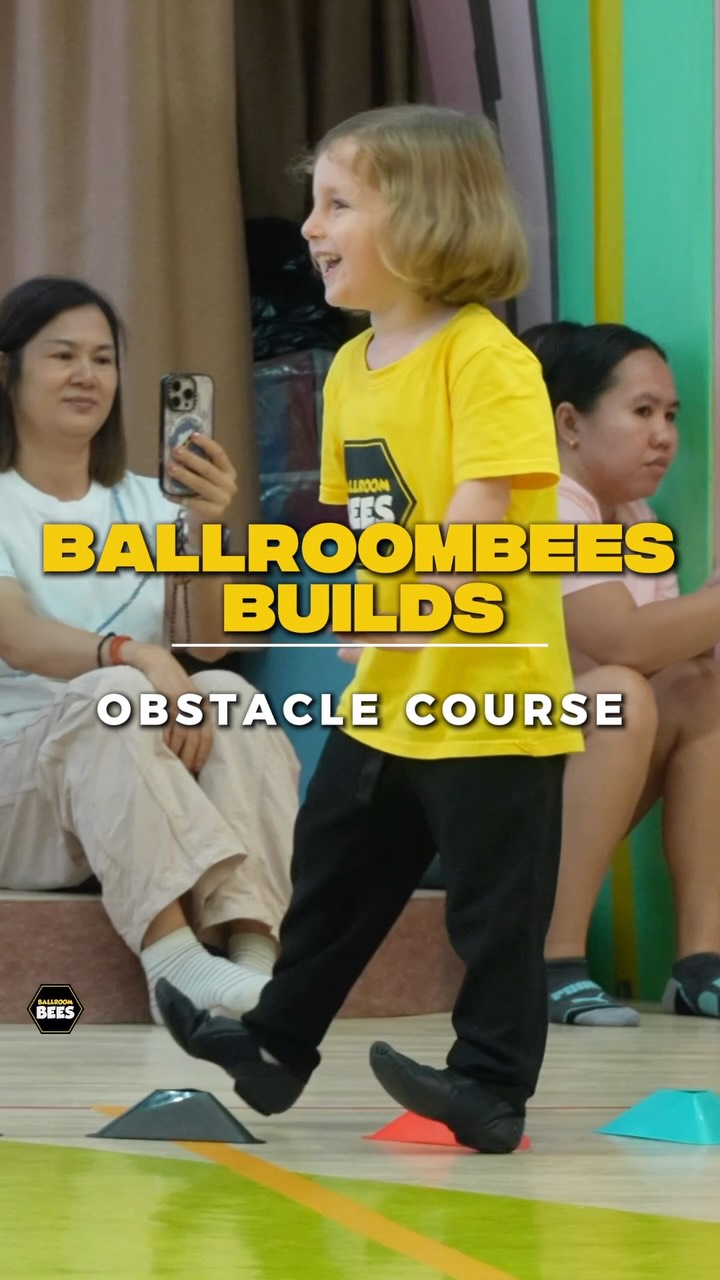 Ever wondered why there’s an obstacle course in our classes? 🐝🤔
At BallroomBees, we believe learning dance technique should feel like an adventure! We use our specially designed obstacle courses to turn traditional Ballroom and Latin foundations into a game.
While the kids are busy having a blast, they’re actually training hard. Here is what’s happening behind the scenes:
✨ Creative Foundations: We sneak Latin and Ballroom basics into the course, teaching footwork and rhythm through play.
🧠 Pattern Power: Remembering the sequence of obstacles boosts memory, concentration, and choreography retention!
⚡ Supercharged Motor Skills: Navigating the course builds the core strength, balance, and spatial awareness essential for future champions.
🏆 Confidence Boost: Completing challenges independently teaches self-reliance and gives our little bees a massive confidence rush!
We don’t just teach dance steps - we build confident, agile, and happy movers. 💛
#BallroomBees #BallroomBeesBuilds #KidsDance #KidsDancing
