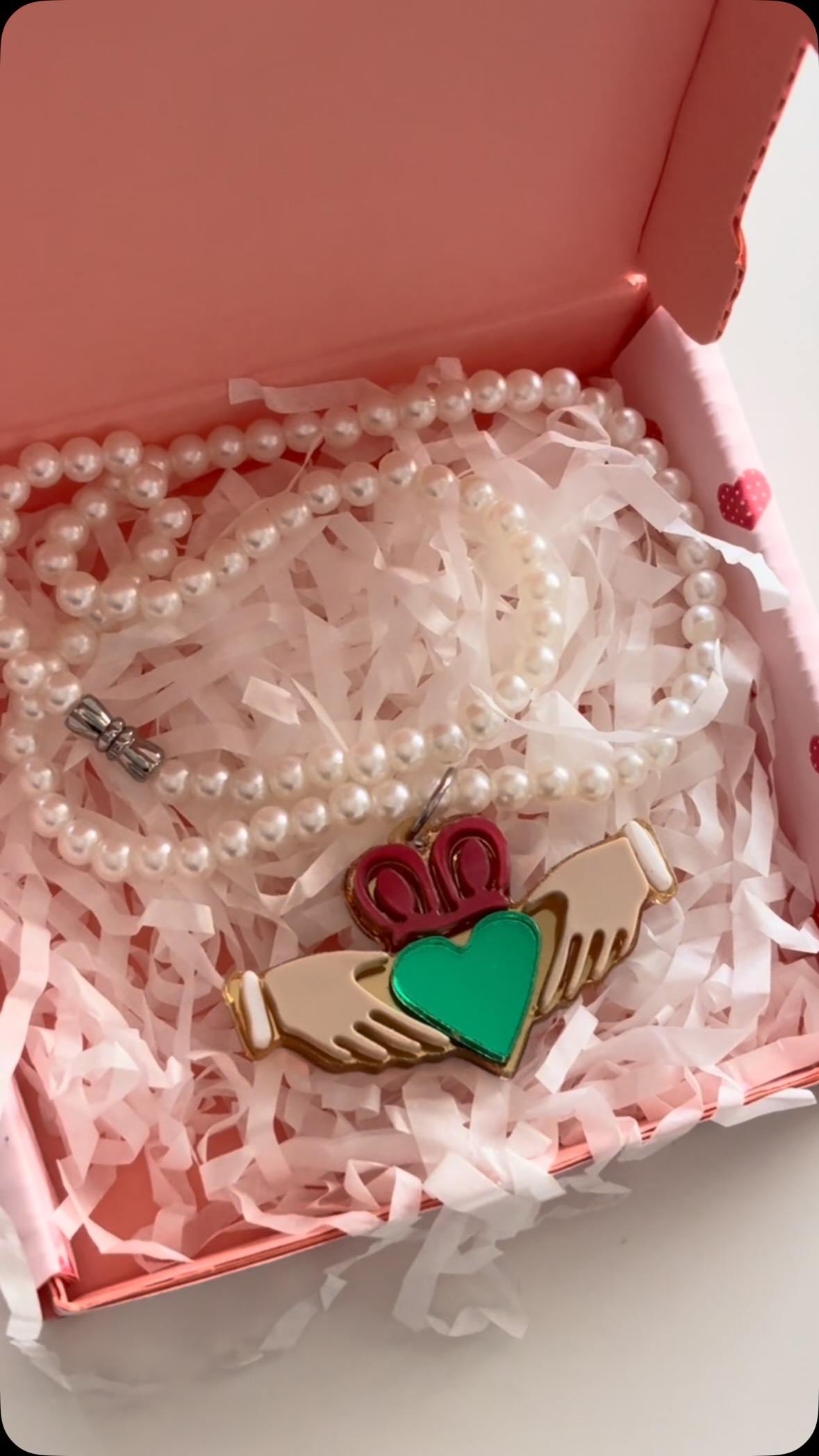 Delicate pearls, an iconic Claddagh, and a piece you’ll treasure for years to come. A timeless symbol of love, loyalty, and friendship. 🤍☘️✨